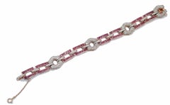 Rubies, Diamonds, Rose Gold and Silver Link Bracelet.