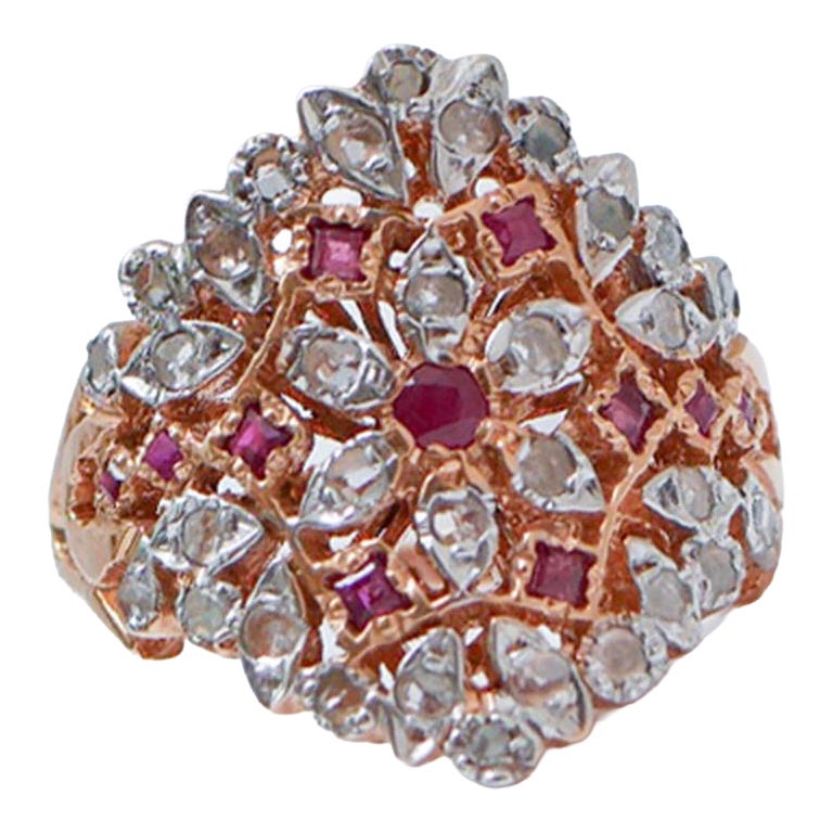 Anello con rubini, diamanti, oro rosa e argento.