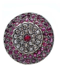 Pendientes de rubíes, diamantes, oro rosa y plata