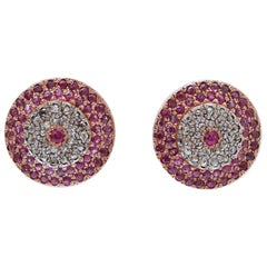 Orecchini con rubini, diamanti, oro rosa e argento