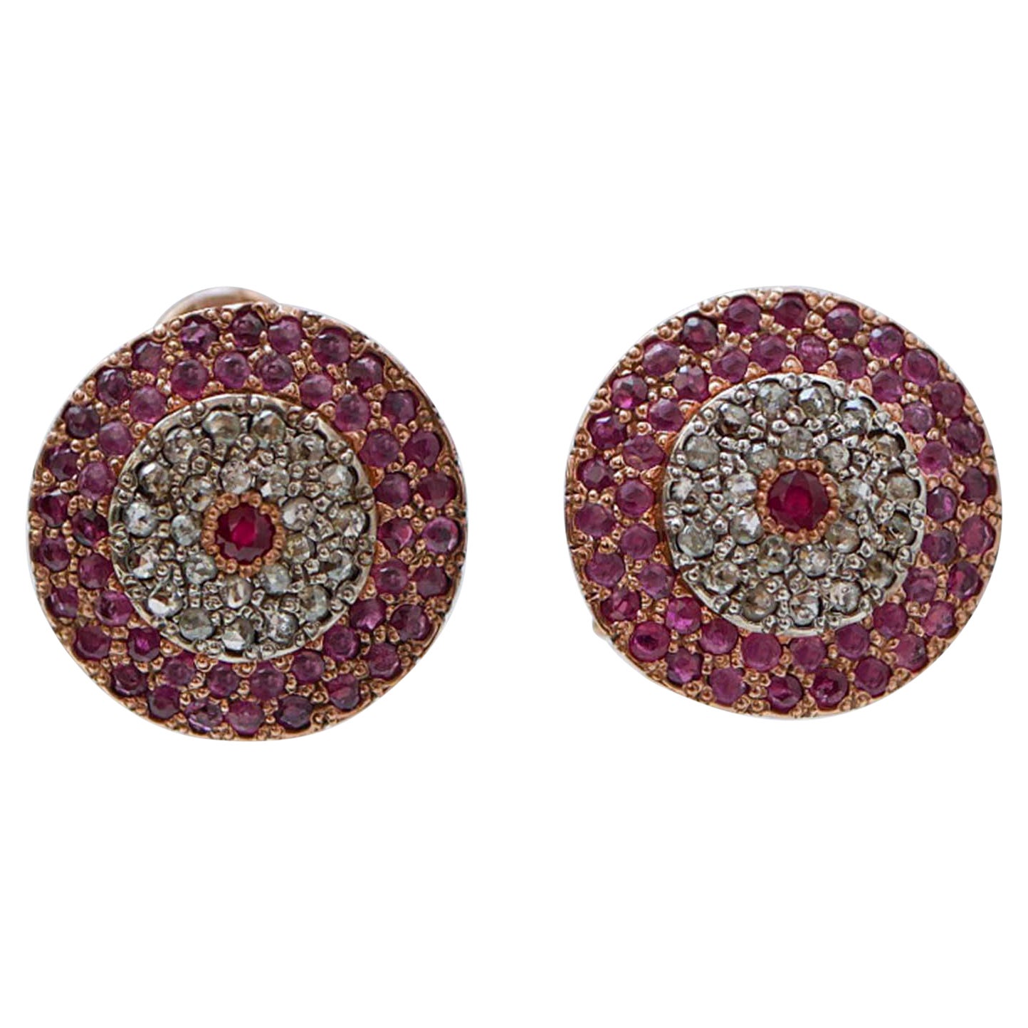 Orecchini con rubini, diamanti, oro rosa e argento