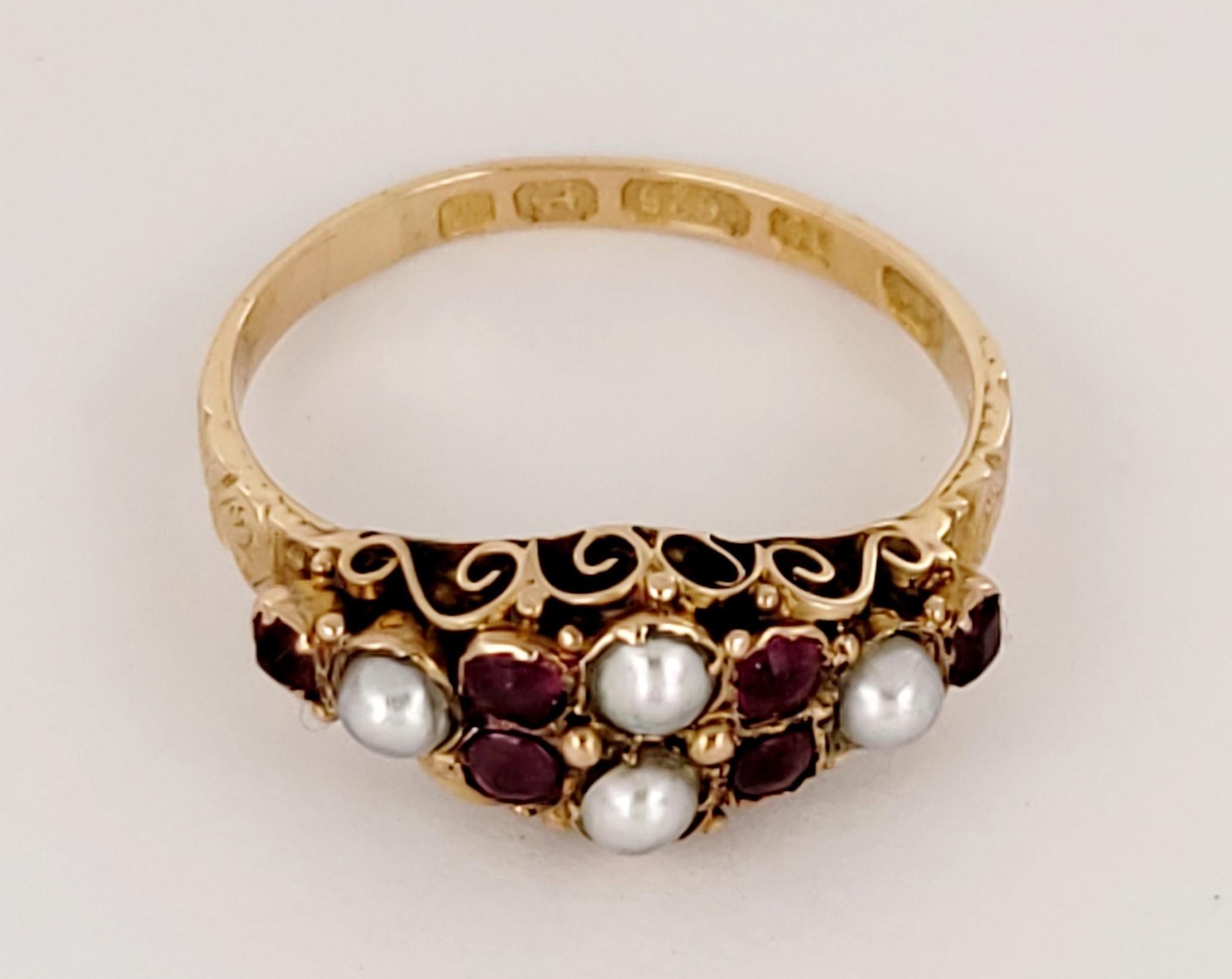 This is an antique handmade piece accented with baby pearls and rubies.
Set in 15k gold.


Weight: 2.2
Size: 7.75
Materials: 15k yellow gold, rubies & pearls
Diamond: 5.7 x 5.7