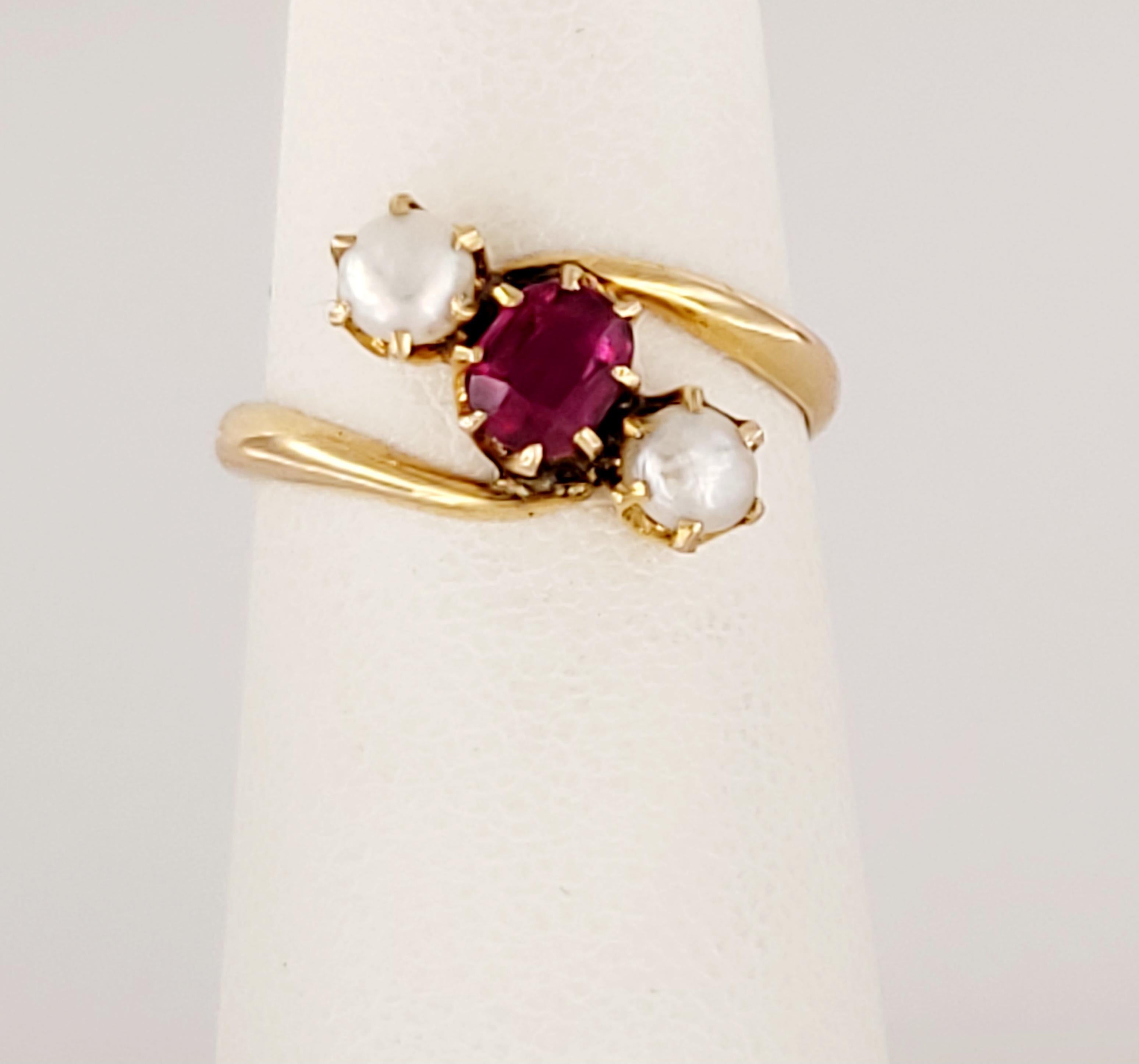 This is an antique handmade piece accented with baby pearls and rubies.
Set in 15k gold.


Weight: 2.2
Size: 7.75
Materials: 15k yellow gold, rubies & pearls
Diamond: 5.7 x 5.7