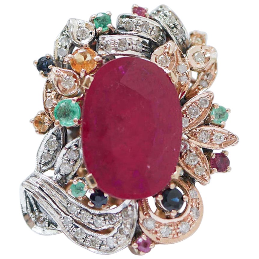 Rubini, zaffiri, smeraldi, diamanti, anello in oro rosa e argento.