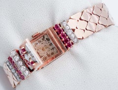 Rubini, diamanti, orologio/bracciale Retrò in oro rosa e bianco 14 carati