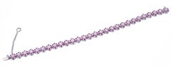 Bracelet à maillons en or blanc 14 carats, rubis et diamants