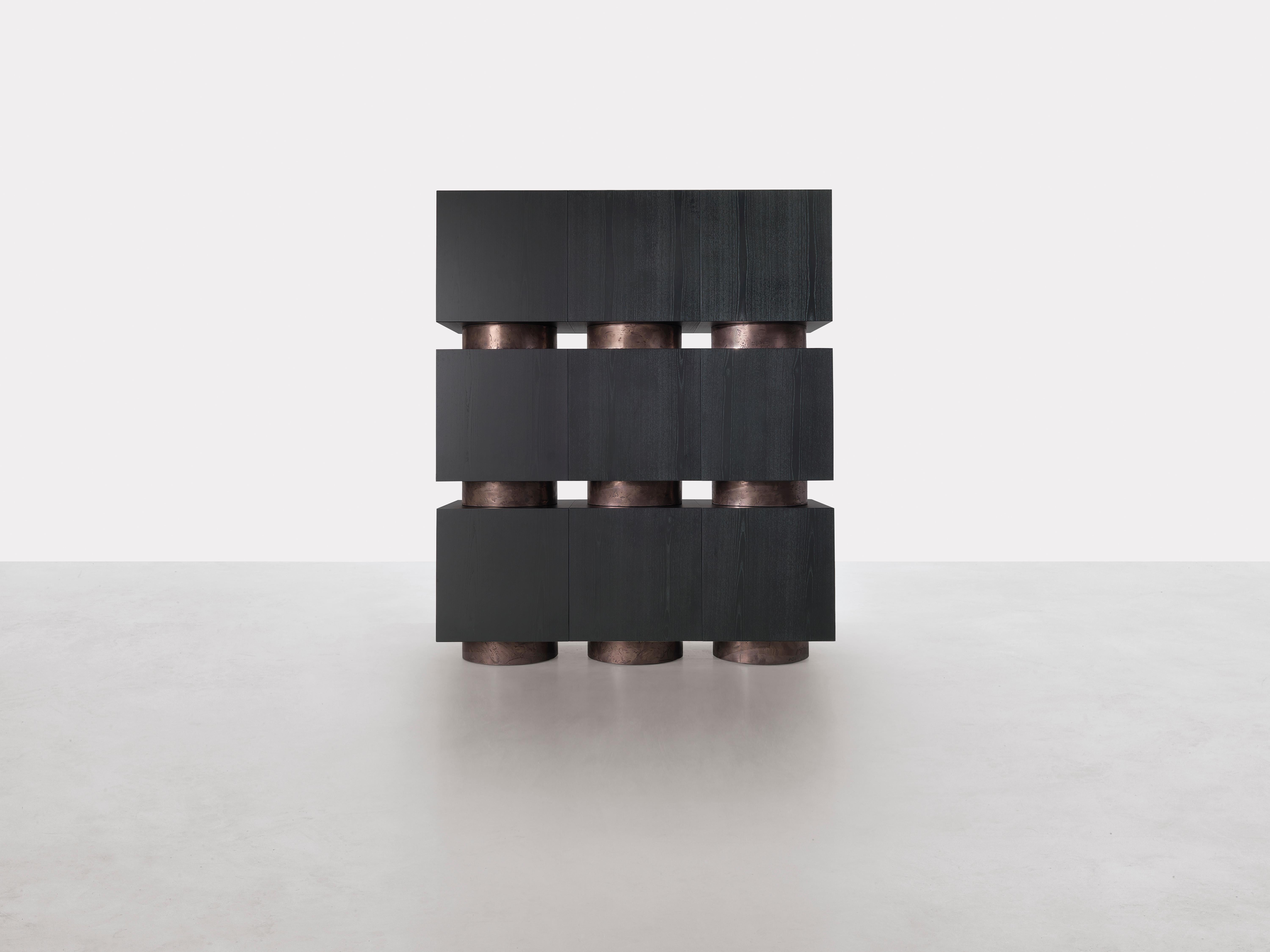 Rubik Container by Somaschini
Dimensions: W 150 x D 50 x H 180 cm
Materials: Plywood structure and door with workmanship at 45 degrees. Doors with push-pull system opening. Internal compartment with bronze glass shelf. The element is modular as