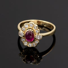 Rubis Cabochon and Diamond 18kt Halo Ring 2