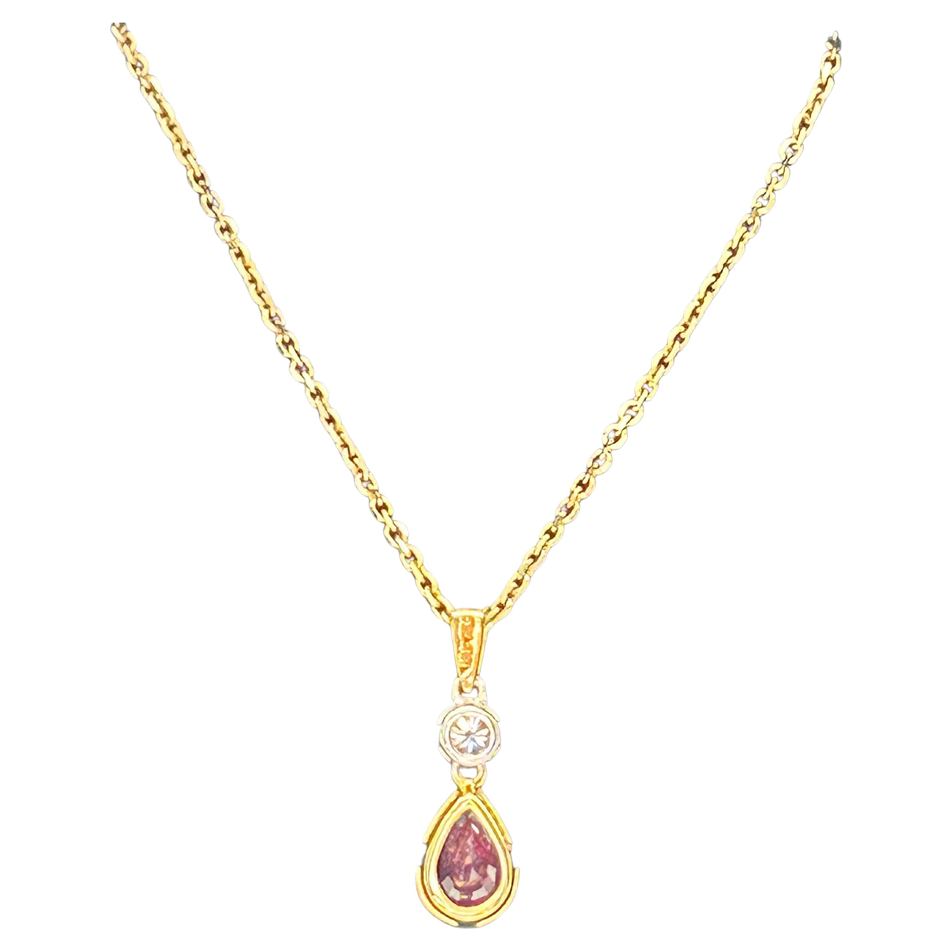 Ruby (0.53ct)  & Diamond (0.06ct) Pendant, 18ct Yellow & White Gold, 9ct Chain. For Sale