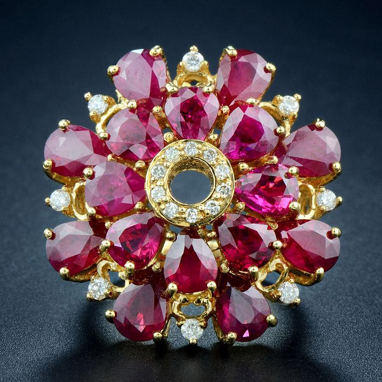 This ring was made in 18K Yellow Gold in size 7.  

It sets with Natural Ruby 16 pcs. 12.50 carat and 0.42 carat of Diamond.

*This ring can be resized, please let us know.