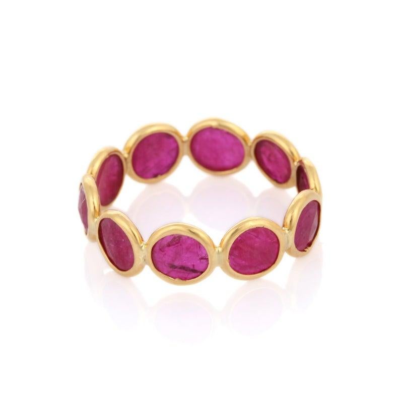 This ring has been meticulously crafted from 18-karat gold and hand set with 4.65 carats ruby. Also available in multi color tourmaline, malachite, rainbow moonstone, peridot, labradorite, turquoise, emerald and garnet.

The ring is a size 7 and may
