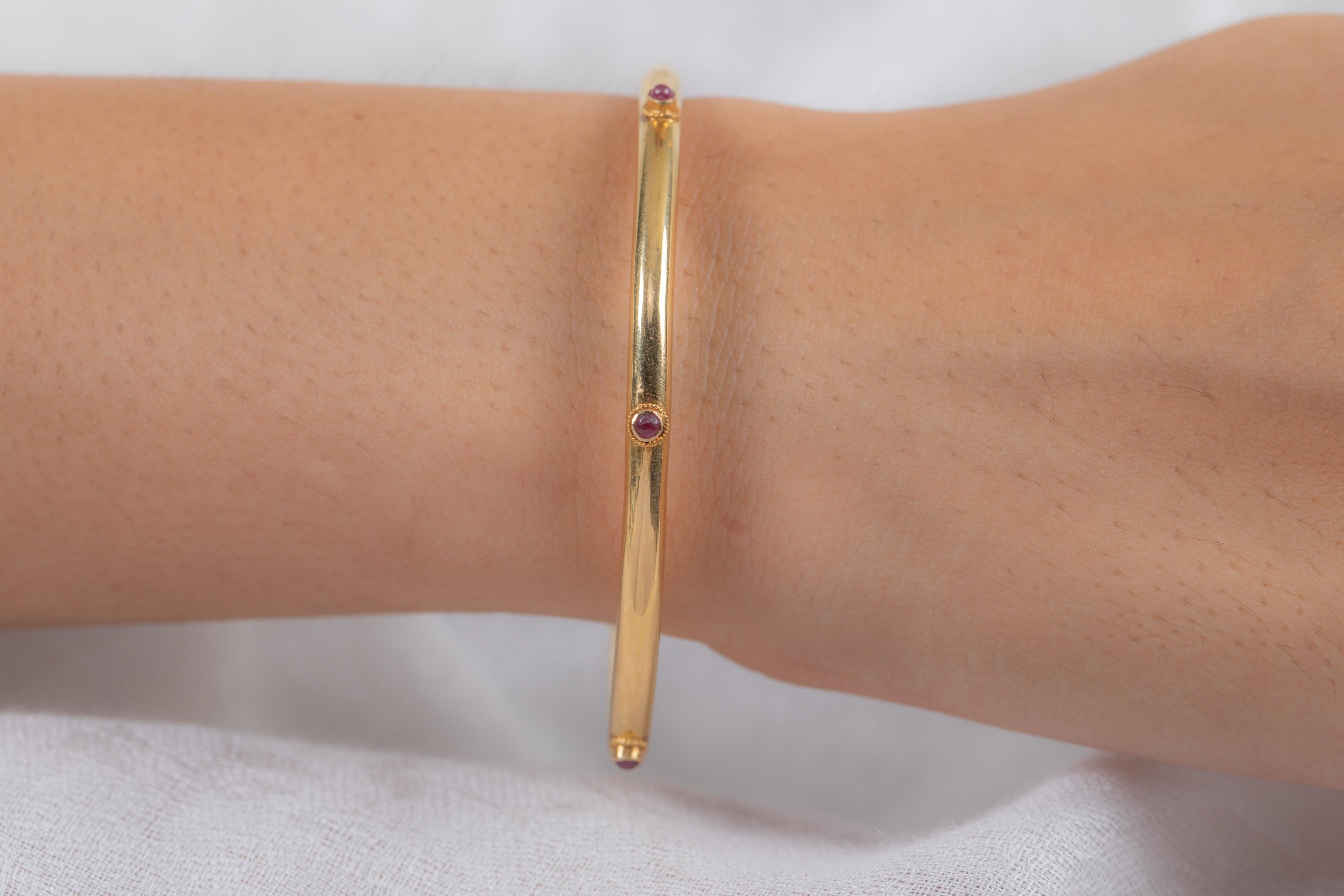 Ruby Bangle in 18K Gold. It’s a great jewelry ornament to wear on occasions and at the same time works as a wonderful gift for your loved ones. These lovely statement pieces are perfect generation jewelry to pass on.
Bangles feel comfortable while