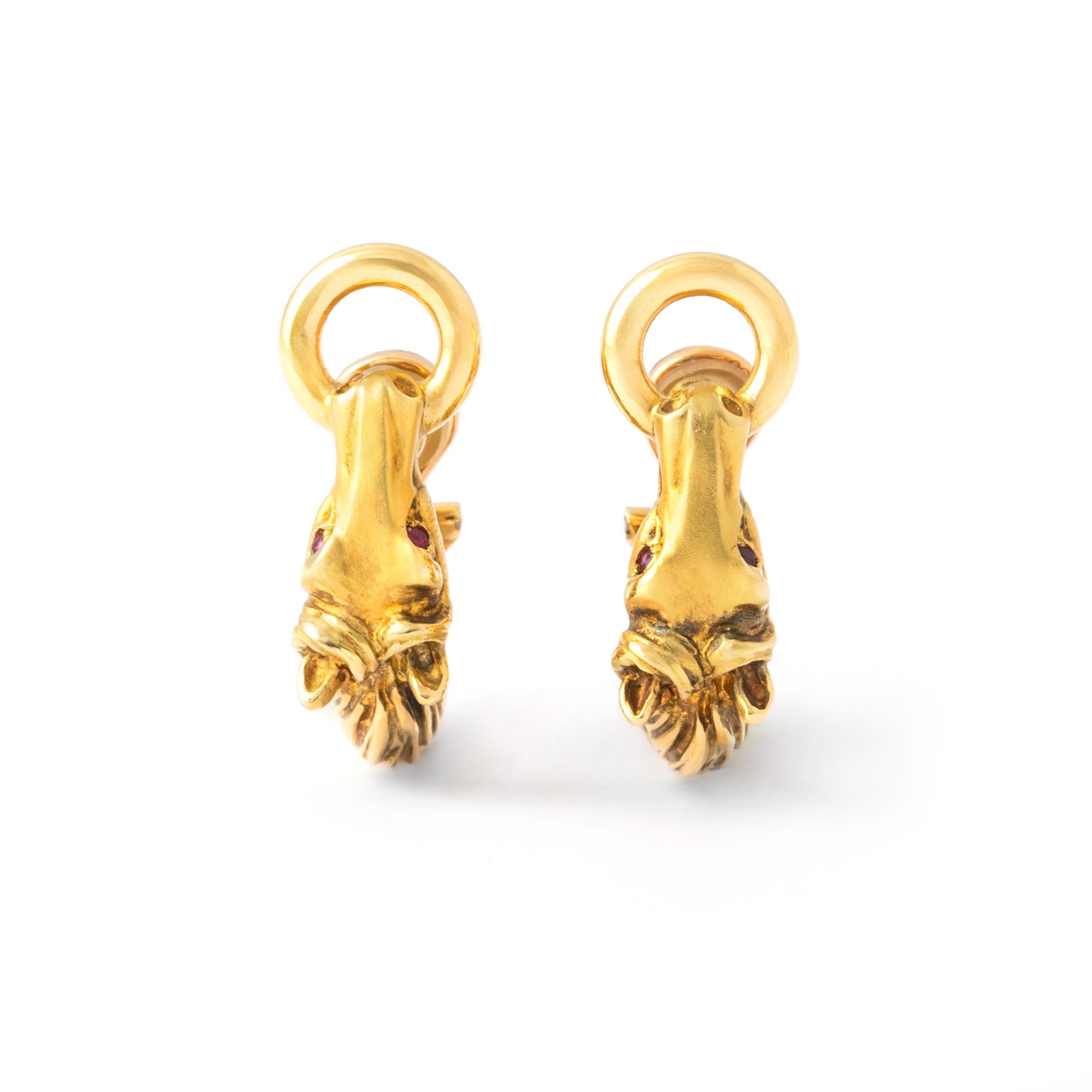 Ruby 18K Yellow Gold Horse Head Earrings.
Total weight: 16.93 grams.
Height: 2.60 centimeters.
Width: 0.40 centimeters up to 0.90 centimeters.