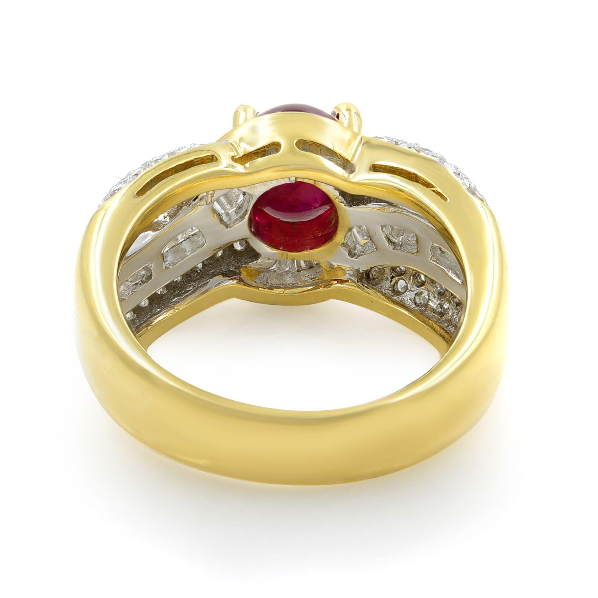 A ravishing, rich cherry red oval-cut ruby, weighing 2.48carats, radiates between of bright baguette diamonds and rows of smaller seamlessly-set further embellished on the sides with round brilliant-cut diamonds, in this classic high-quality estate
