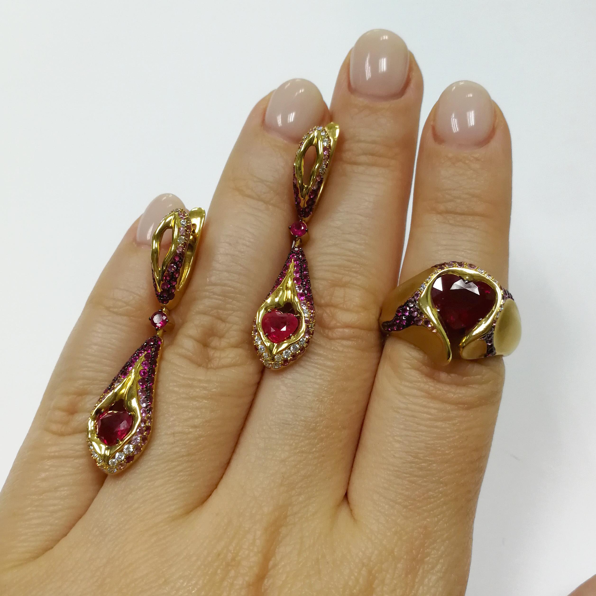 Ruby 3.34 Carat Pink Sapphires Diamonds 18 Karat Yellow Gold HeartBeat Suite
Suite from the HeartBeat Collection. Сomposition resembles an exploded volcano, from the mouth of which lava flows from all sides. Center of the Yellow 18K Gold 