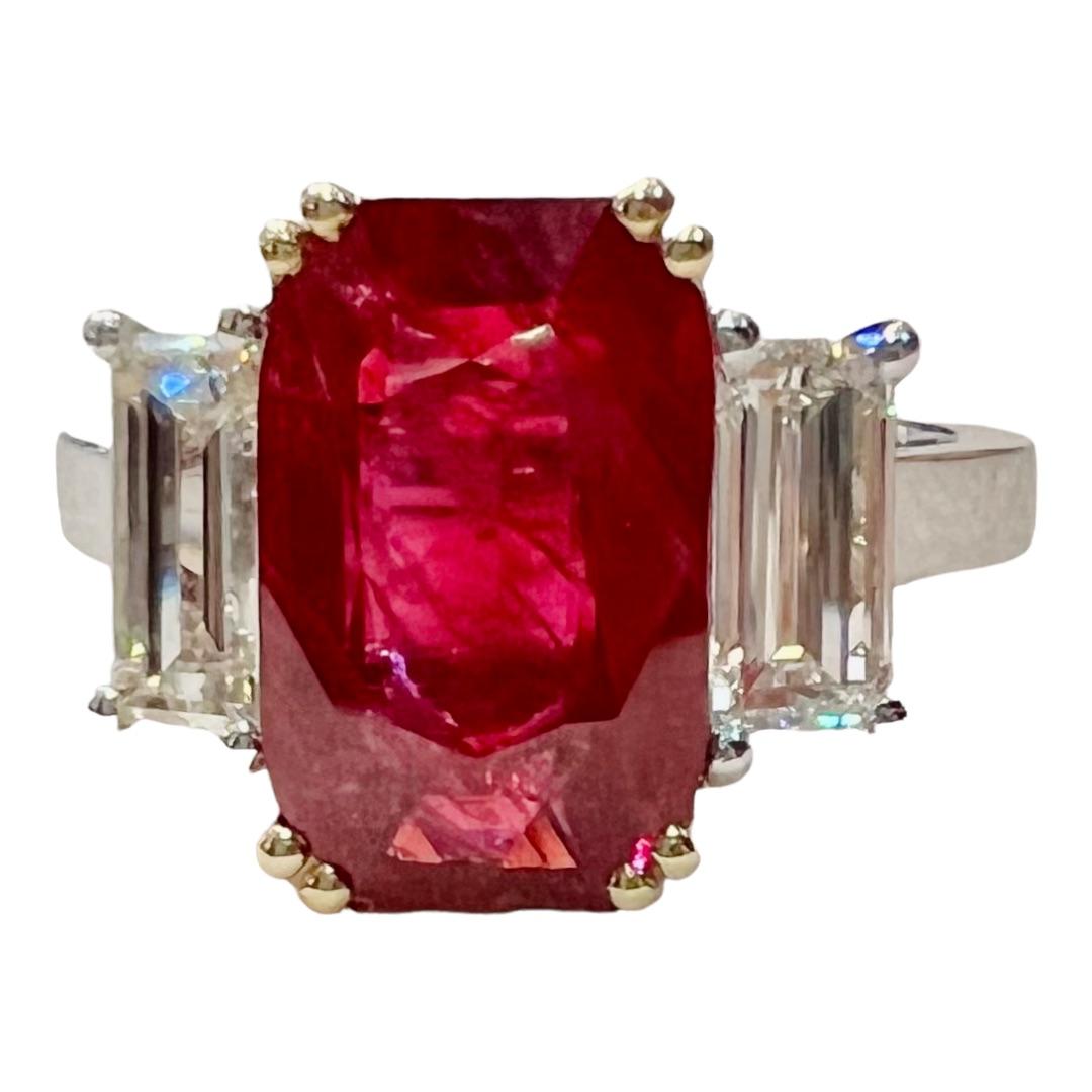 Baguette Cut Ruby : 4, 07 Carat and Two Diamonds : 1, 19 Carat Engagement Ring