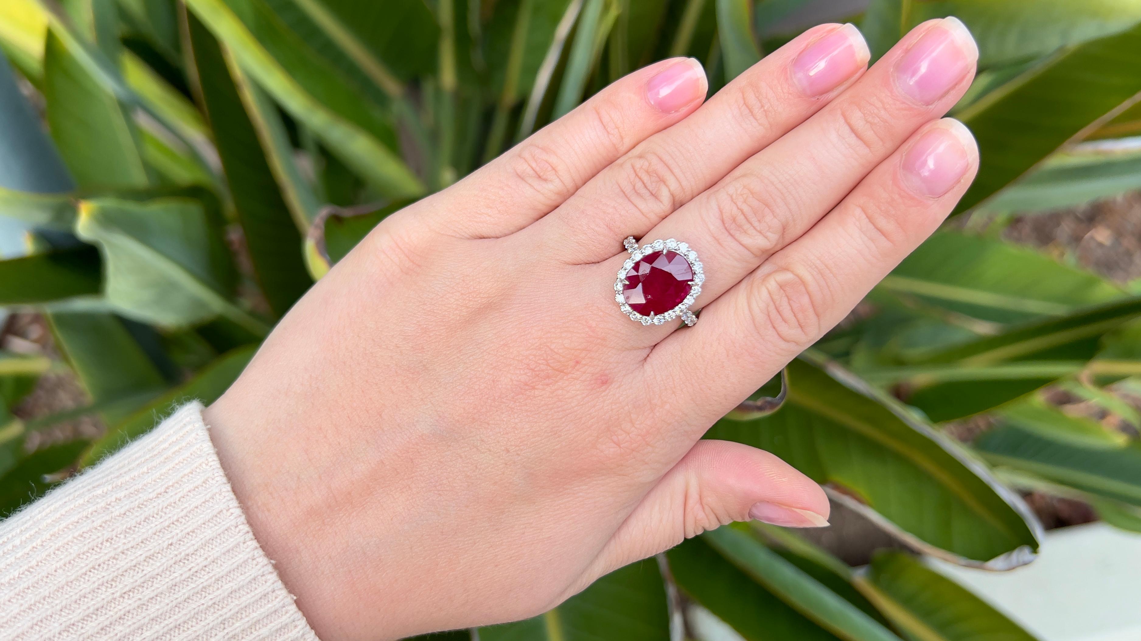 Ruby = 6.50 Carat 
Cut: Oval
Diamonds = 0.80 Carats
( Color: F, Clarity: VS )
Metal: 18K Gold
Ring Size: 7* US
*It can be resized complimentary