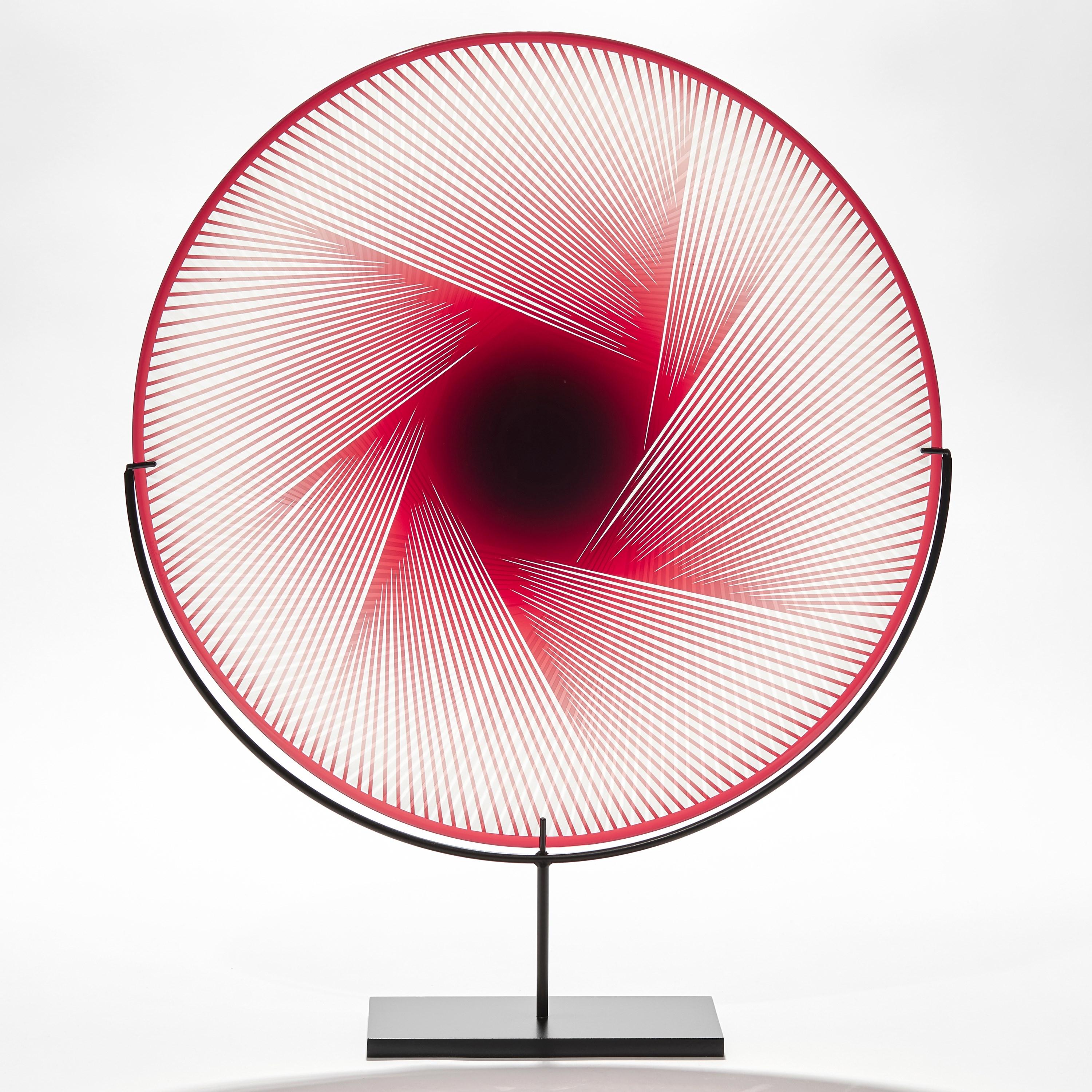 'Ruby Abstract II' is a unique red and clear hand-blown and etched glass sculptural plate by the British artist Kate Jones, with a painted steel base.

Created with Stephen Gillies, with whom Jones makes many works in collaboration, these