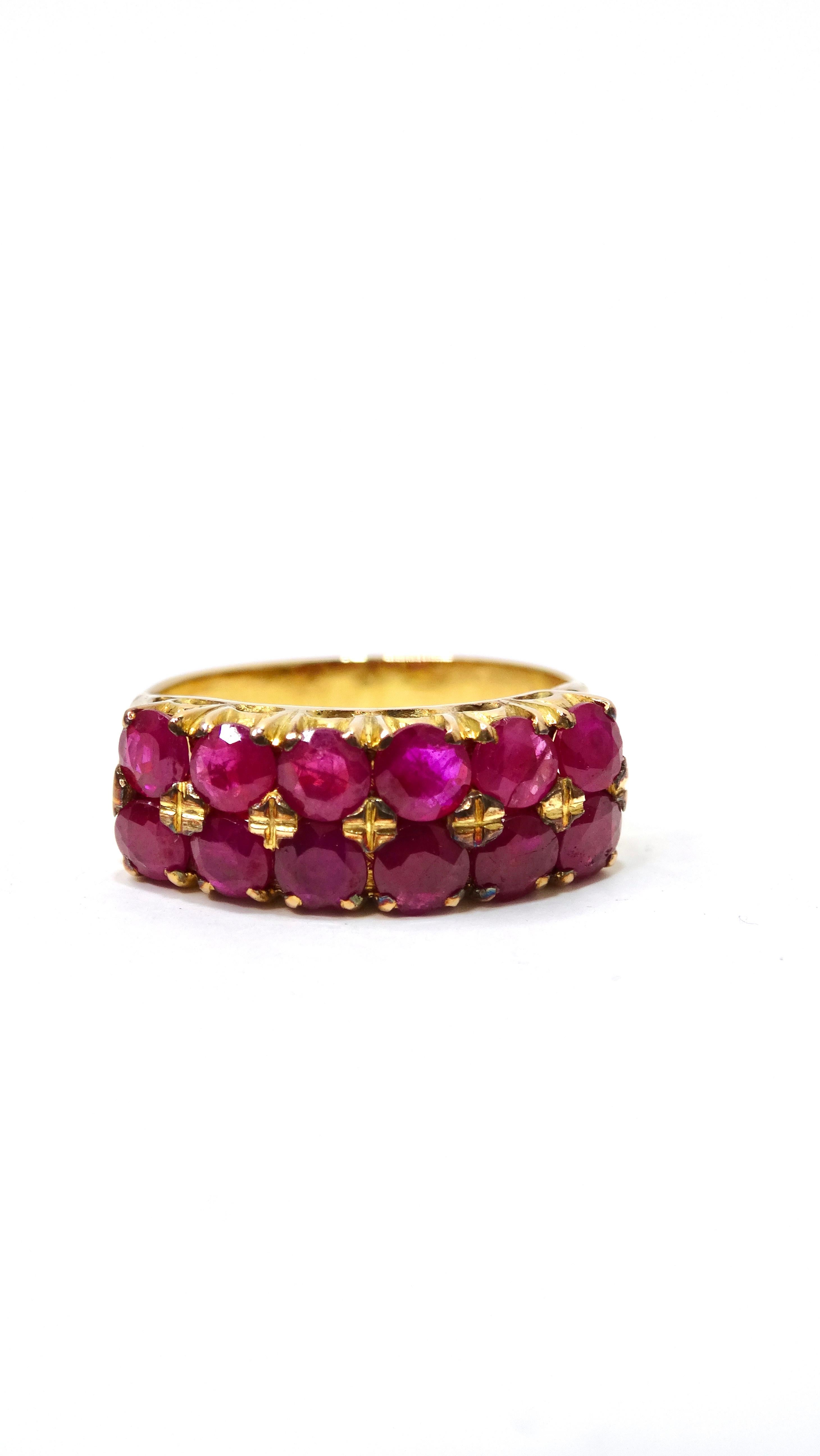 This ring is eye-candy! The sparkle and detail will have you drooling. There is something so effortless about a clustered ring. This ring features a yellow 14k gold band that still has a bright and bold color with 12 ruby round-cut gems decorating