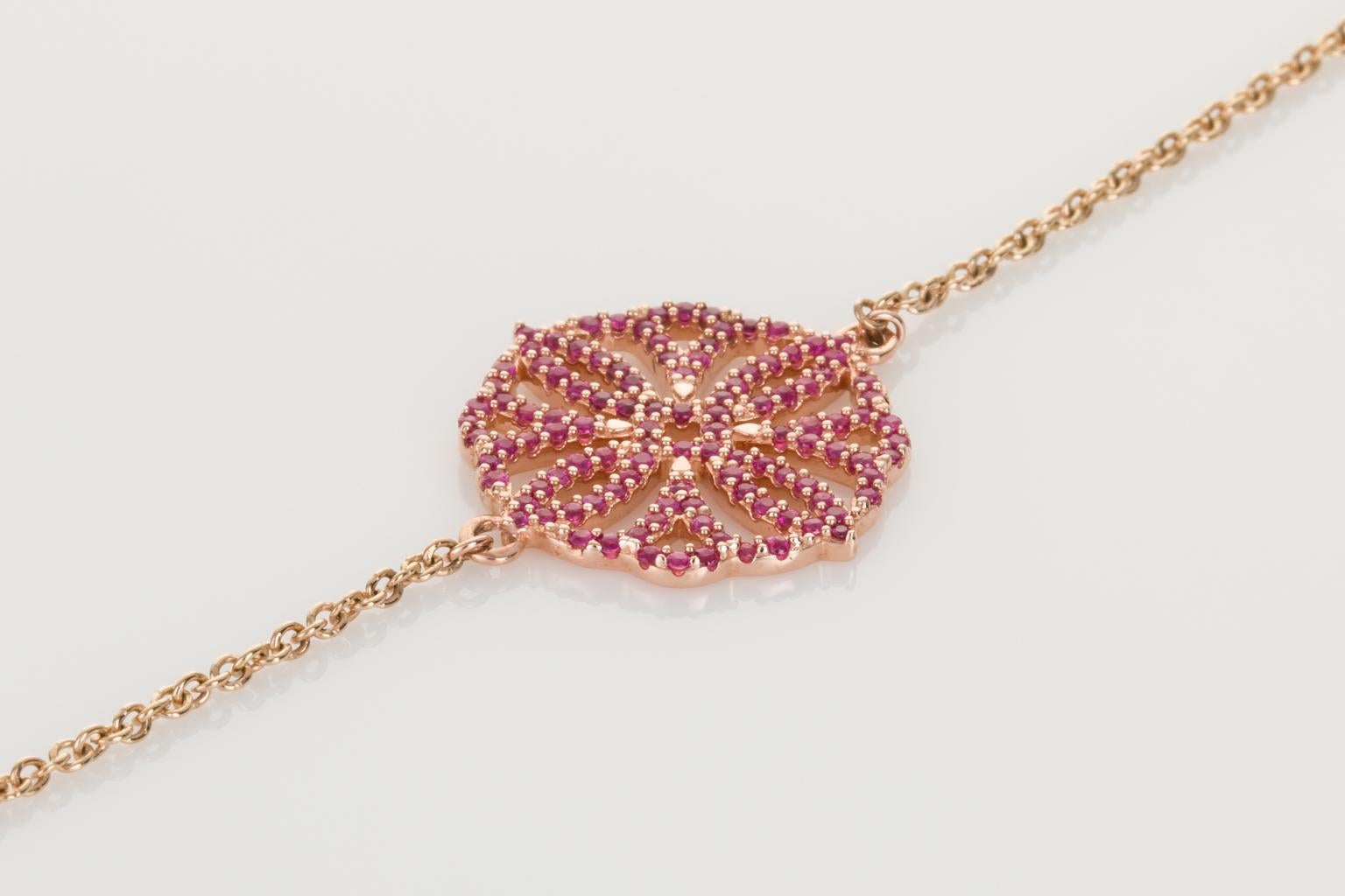 Contemporary Ruby and 9 Karat Rose Gold Flower Chain Bracelet For Sale
