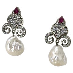 Ruby and Baroque Pearl Fleur-de-Lis Dangle Earrings
