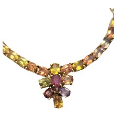 Collier en or orné de rubis et de citrines