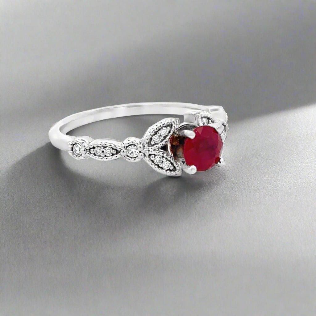 Featuring vintage details, this 14K white gold ring showcases the timeless beauty of rubies and diamonds. The perfect blend of elegance and uniqueness, it is sure to add a touch of sophistication to any outfit.

Jewelry Style : Ring
Metal Type : 14K