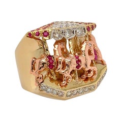 Ruby and Diamond 14 Karat Yellow and Rose Gold Carousel Ring