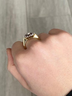 Anello a grappolo con rubini e diamanti in oro 18 carati