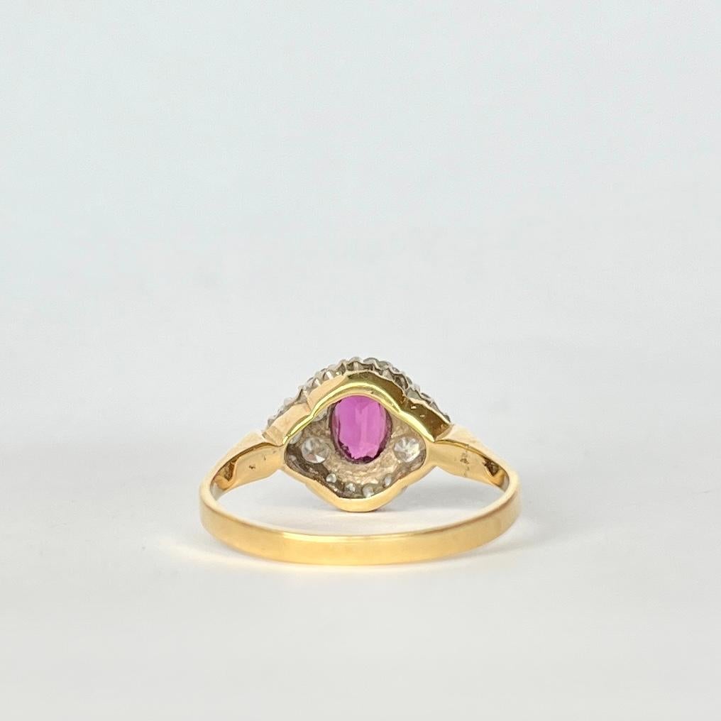 Oval Cut Ruby and Diamond 18 Carat Gold Cluster Ring For Sale