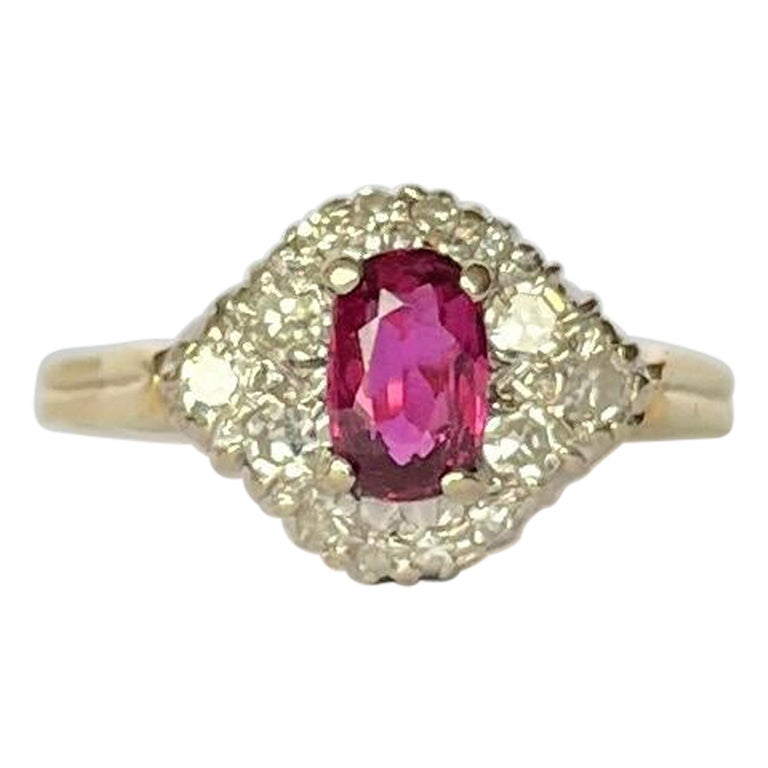 Bague grappe en or 18 carats avec rubis et diamants