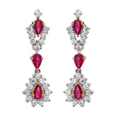 Pendientes de gota de oro de 18 quilates con rubíes y diamantes