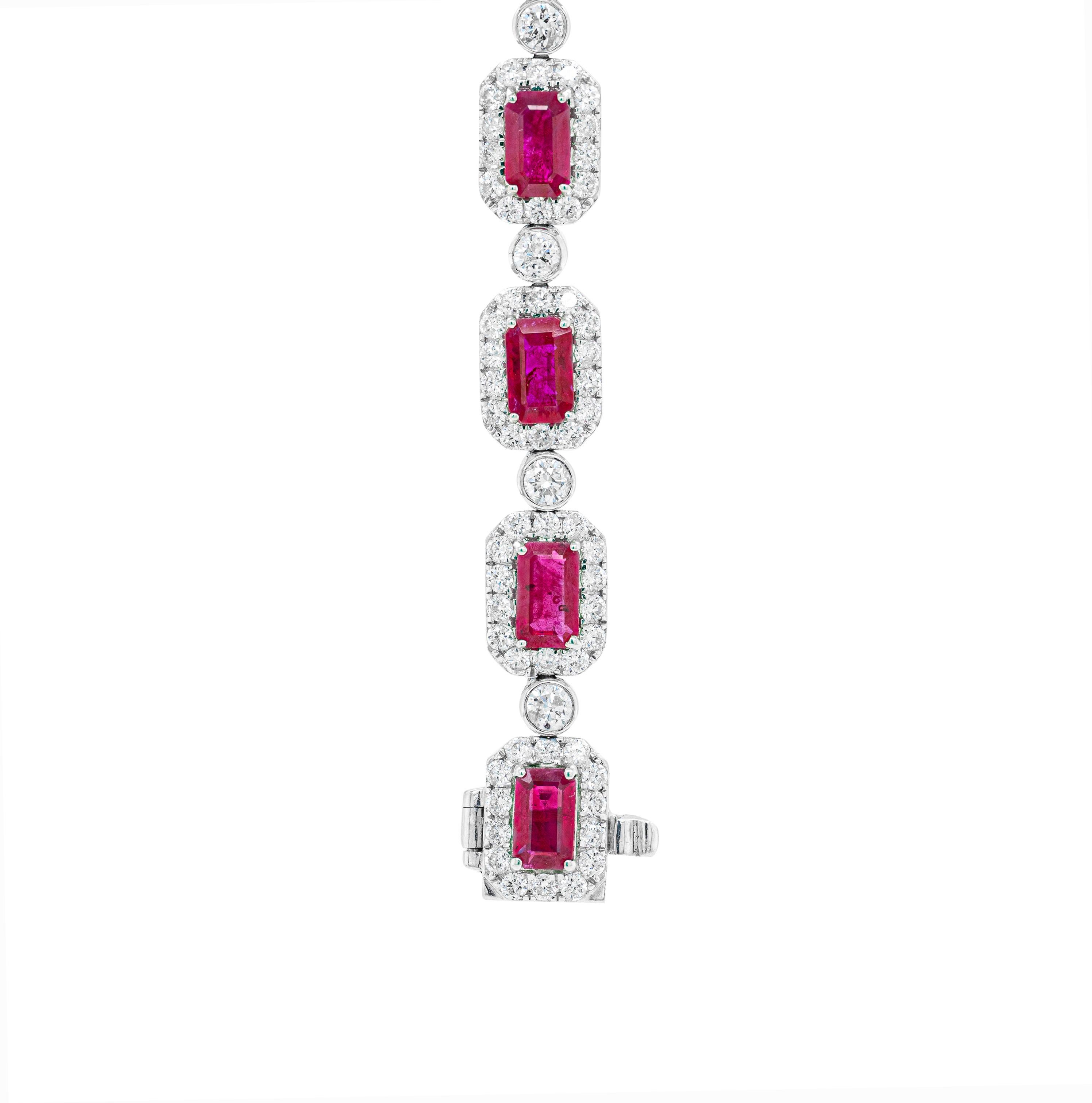 Bracelet featuring 17 fine quality emerald cut rubies weighing a total of 4.80ct all mounted in open back claw settings. Each ruby is surrounded by 14 round brilliant cut micro claw set diamonds also in open back settings all connected by a rub over