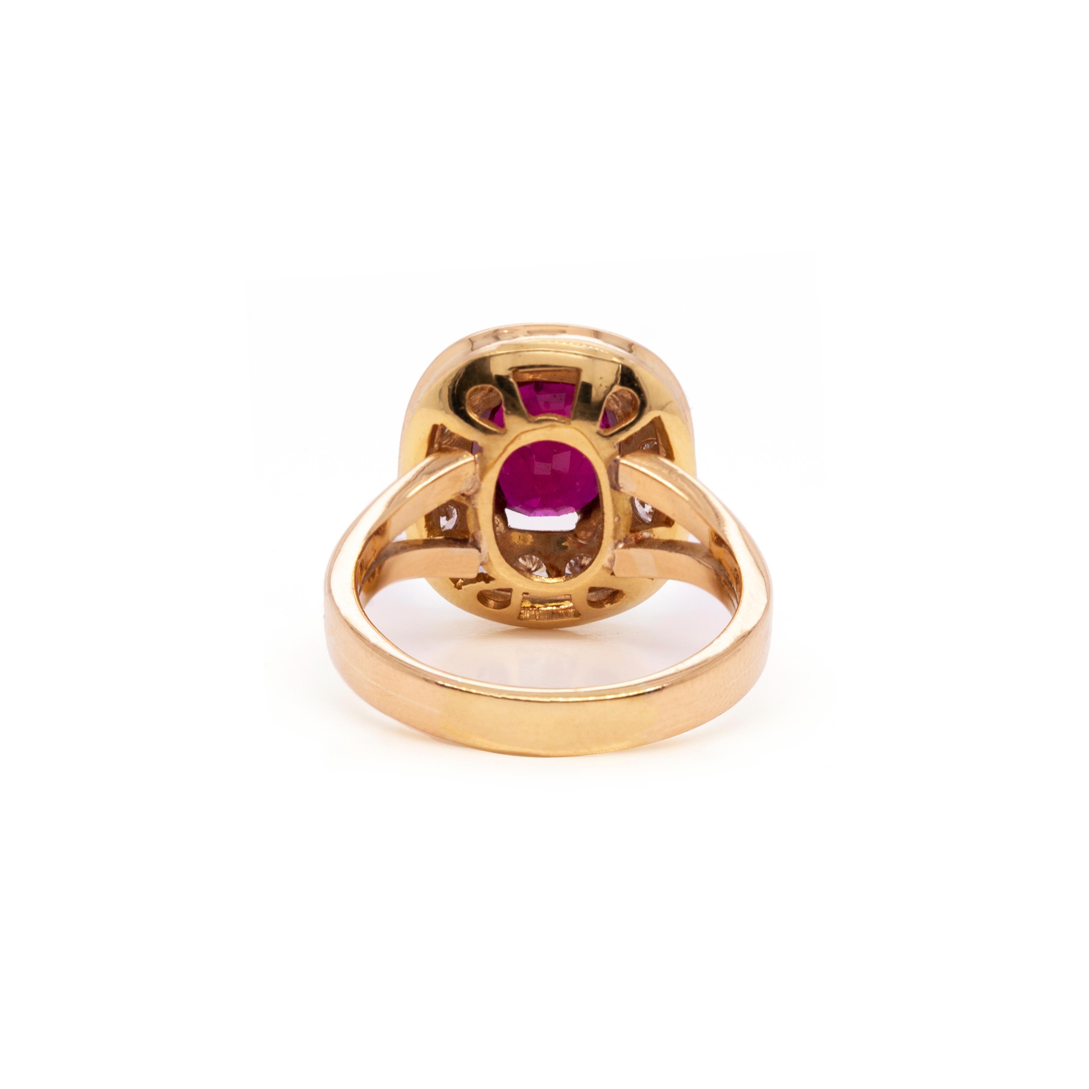 Exuding an elegant and timeless beauty, this charming piece will make the perfect ruby and diamond engagement ring.
At its heart lies a breathtaking vibrant red cushion shaped ruby, with an approximate weight of 2.40ct, mounted in a four double