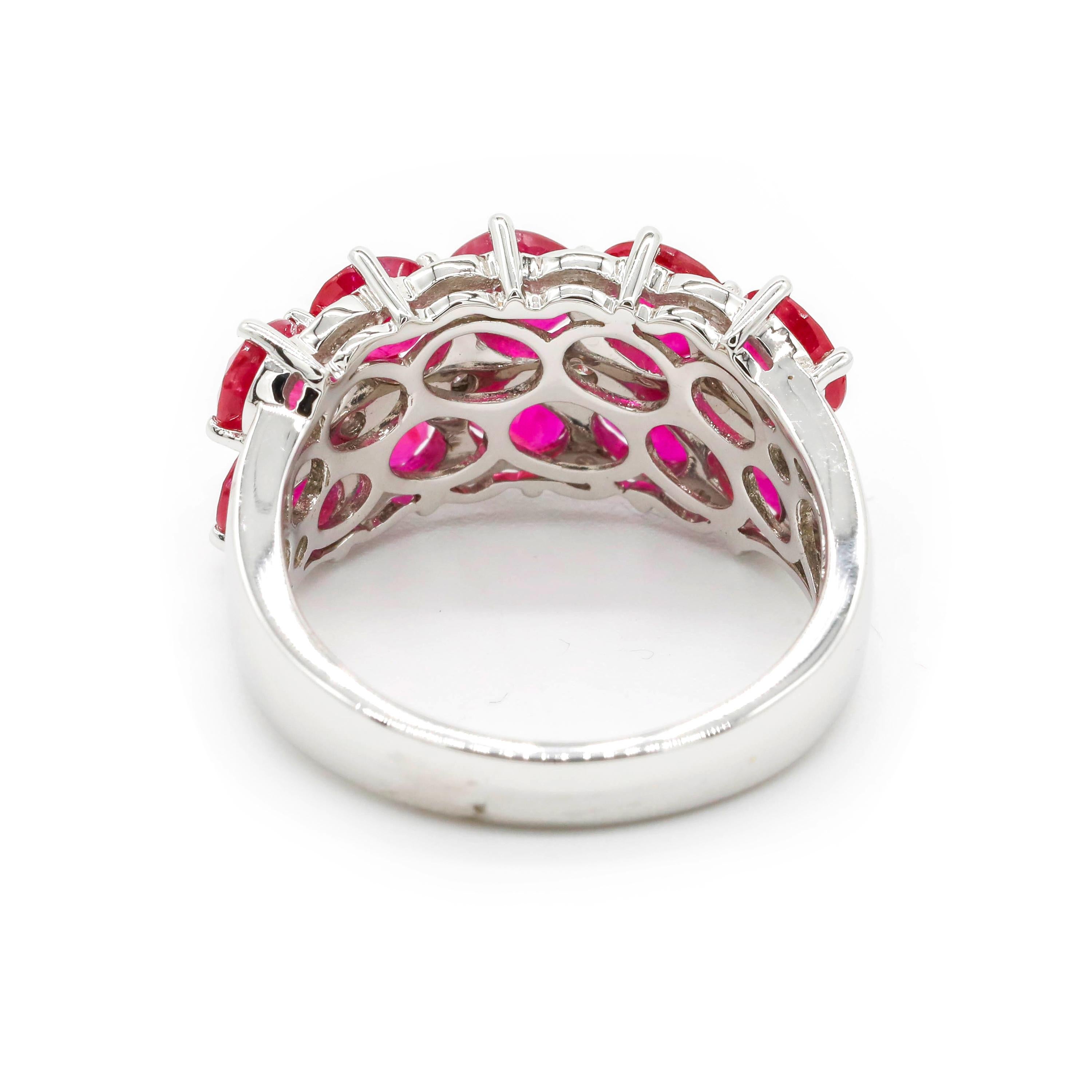 Contemporary 4.68 Carat Oval Cut Ruby and 0.08 Ct Round Diamond 18k White Gold Cluster Ring For Sale