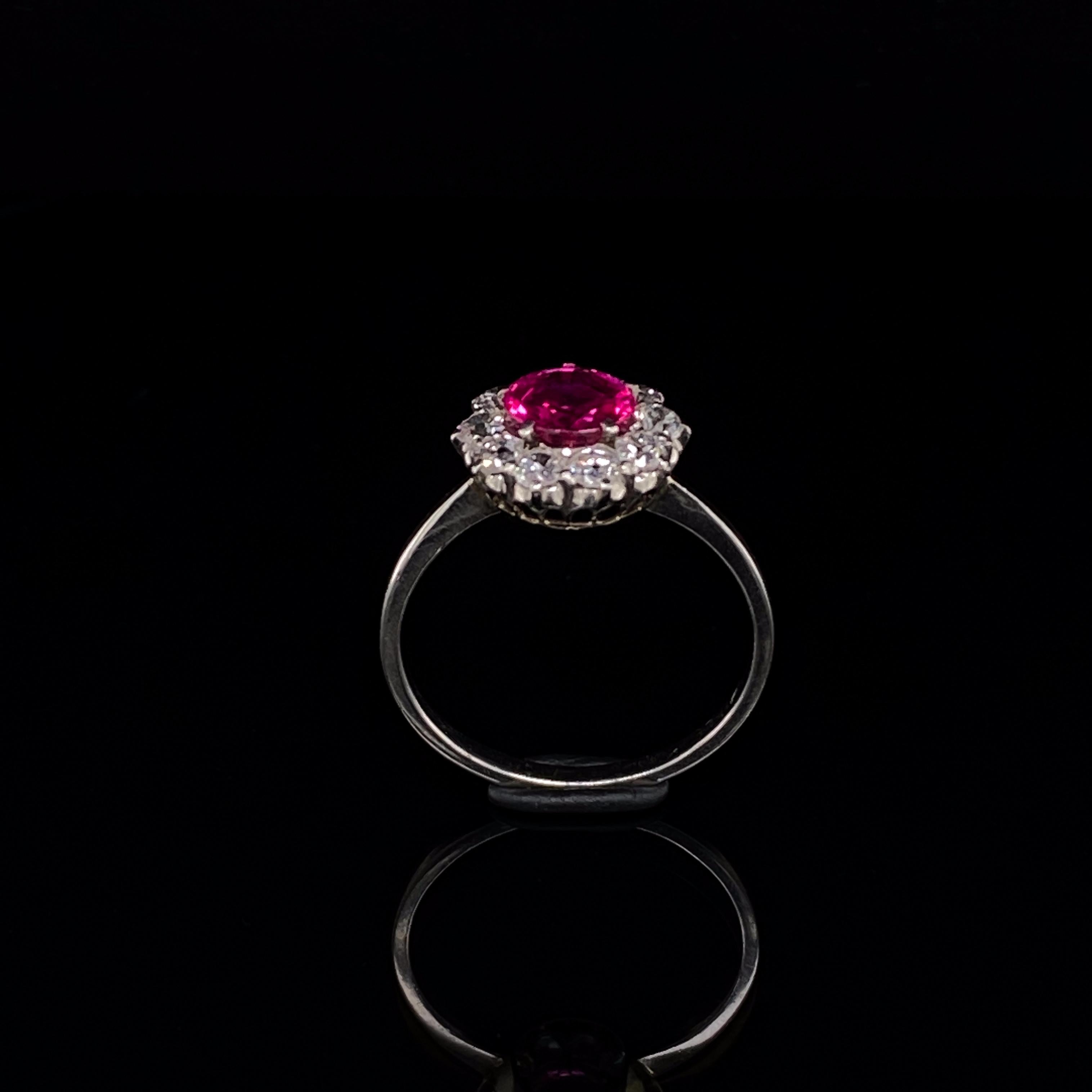 Round Cut Ruby and Diamond 18 Karat White Gold Cluster Engagement Ring Circa 1900
