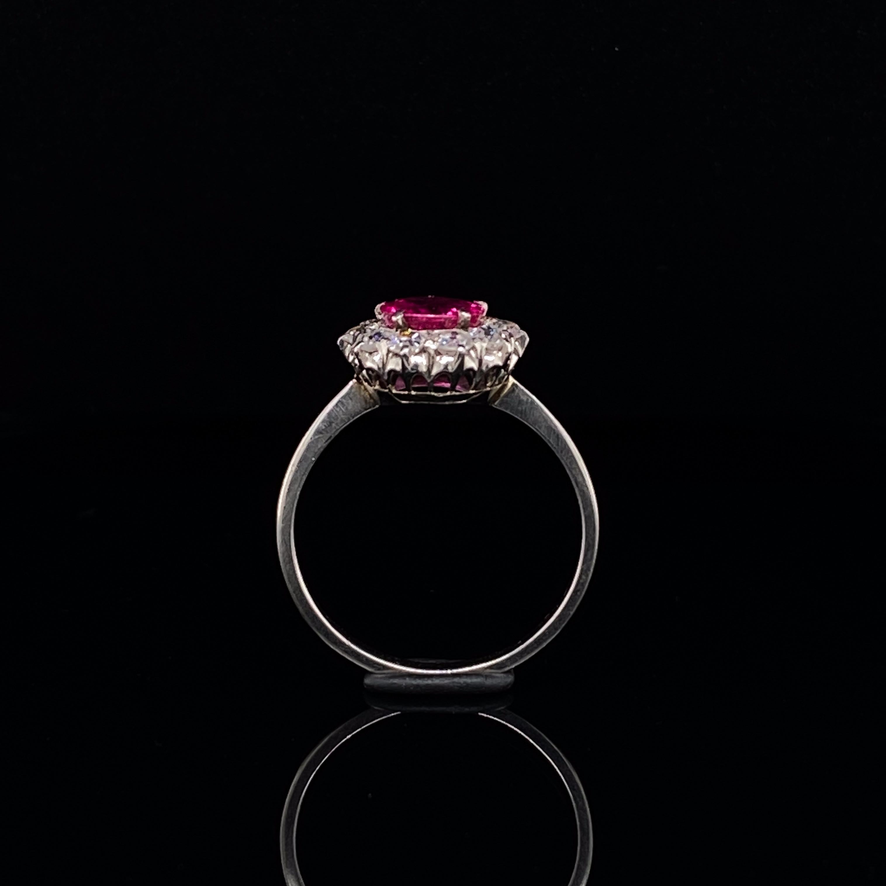 Women's Ruby and Diamond 18 Karat White Gold Cluster Engagement Ring Circa 1900