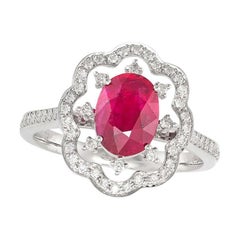 Halo-Ring mit Rubin und Diamant aus 18 Karat Weißgold