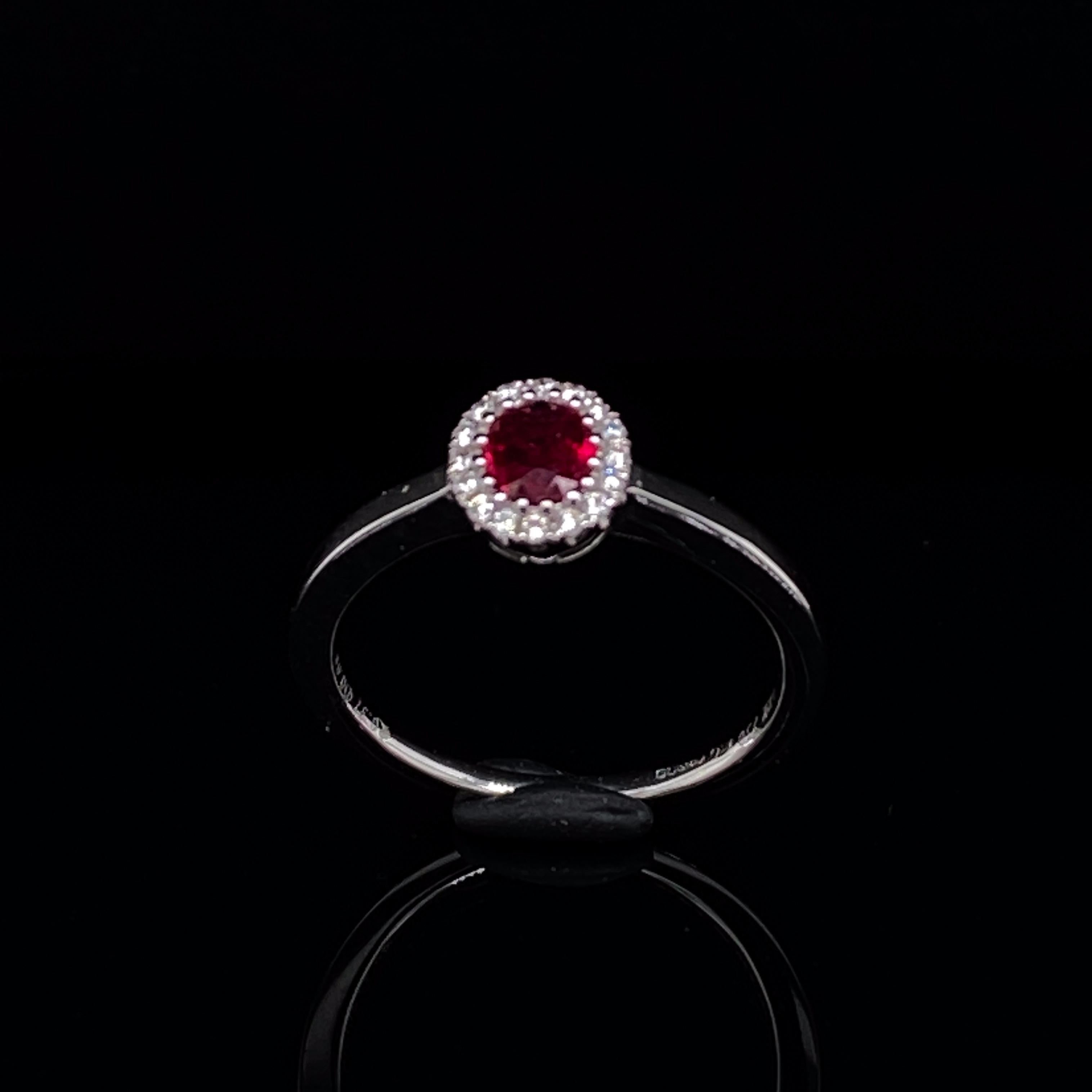 Oval Cut Ruby and Diamond 18 Karat White Gold Oval Cluster Ring For Sale