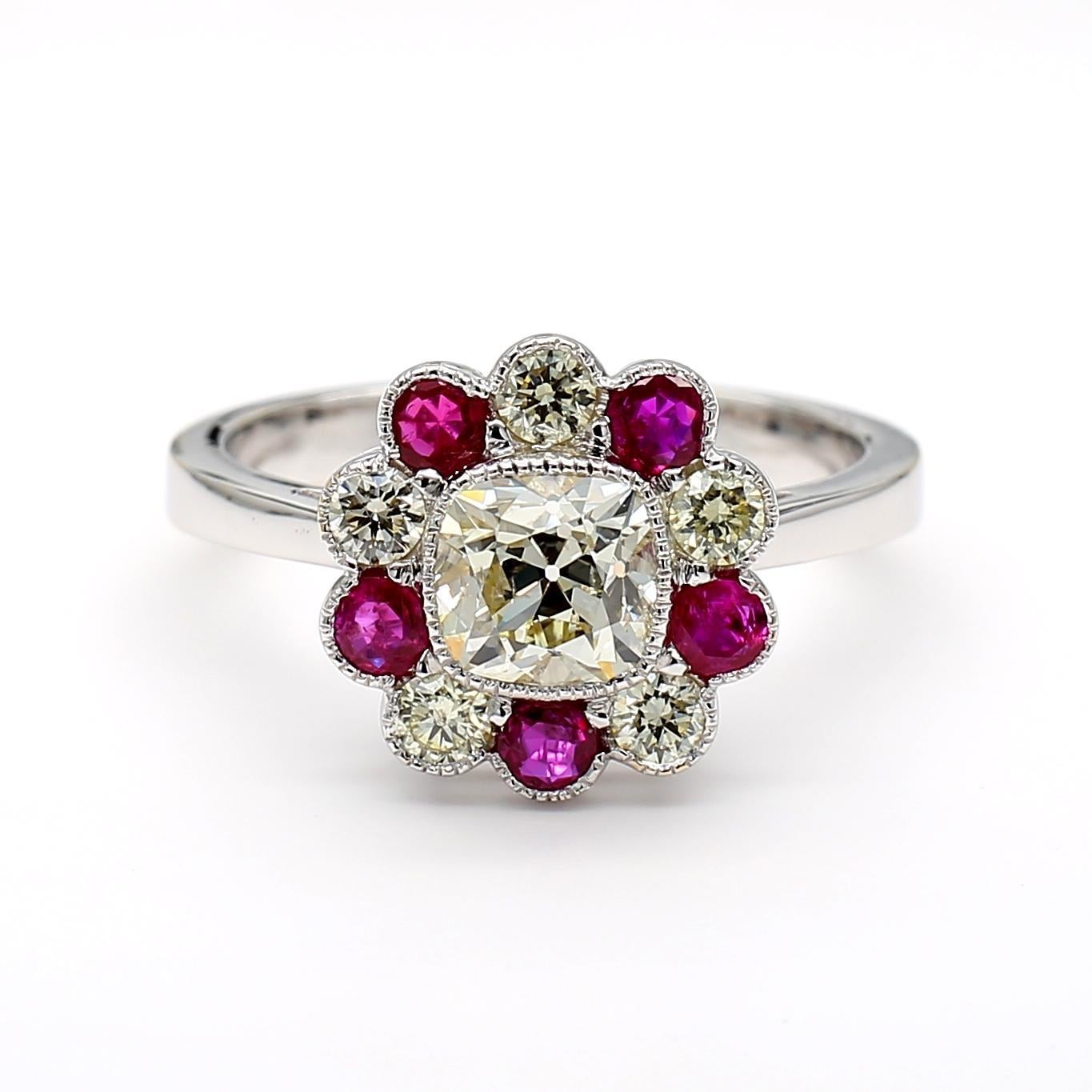 Antique Art Deco Style old mine diamond ring. At its heart lies a 1.01 carat cushion-cut diamond, showcasing a pristine white hue and VS2 clarity. This central gem captivates with its brilliance and refined elegance.

Encircling the diamond are