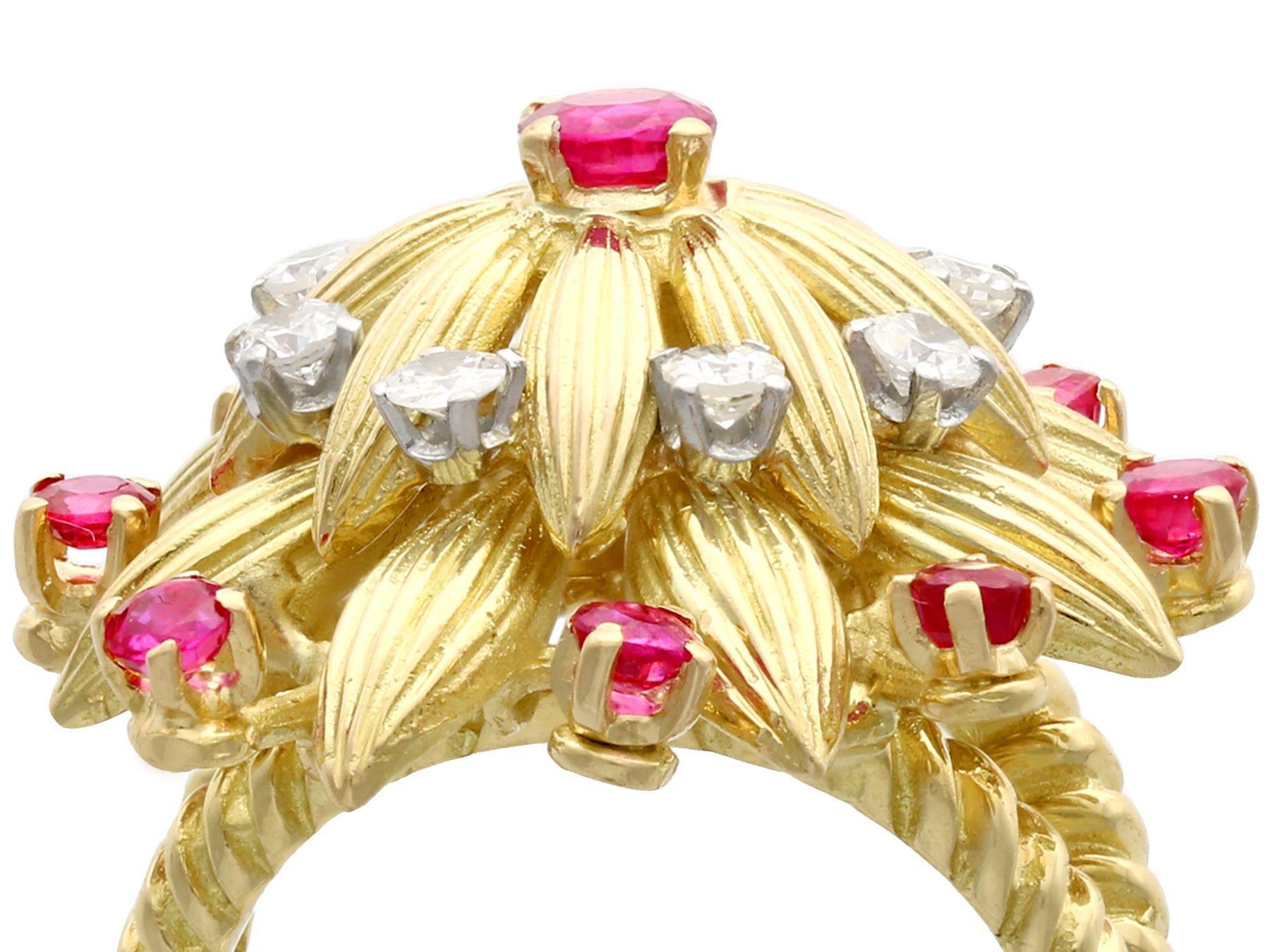 A stunning, fine and impressive vintage 0.73 carat ruby and 0.48 carat diamond, 18k yellow cocktail ring; part of our diverse vintage estate jewelry collections.

This stunning, fine and impressive ruby and diamond ring has been crafted in 18k