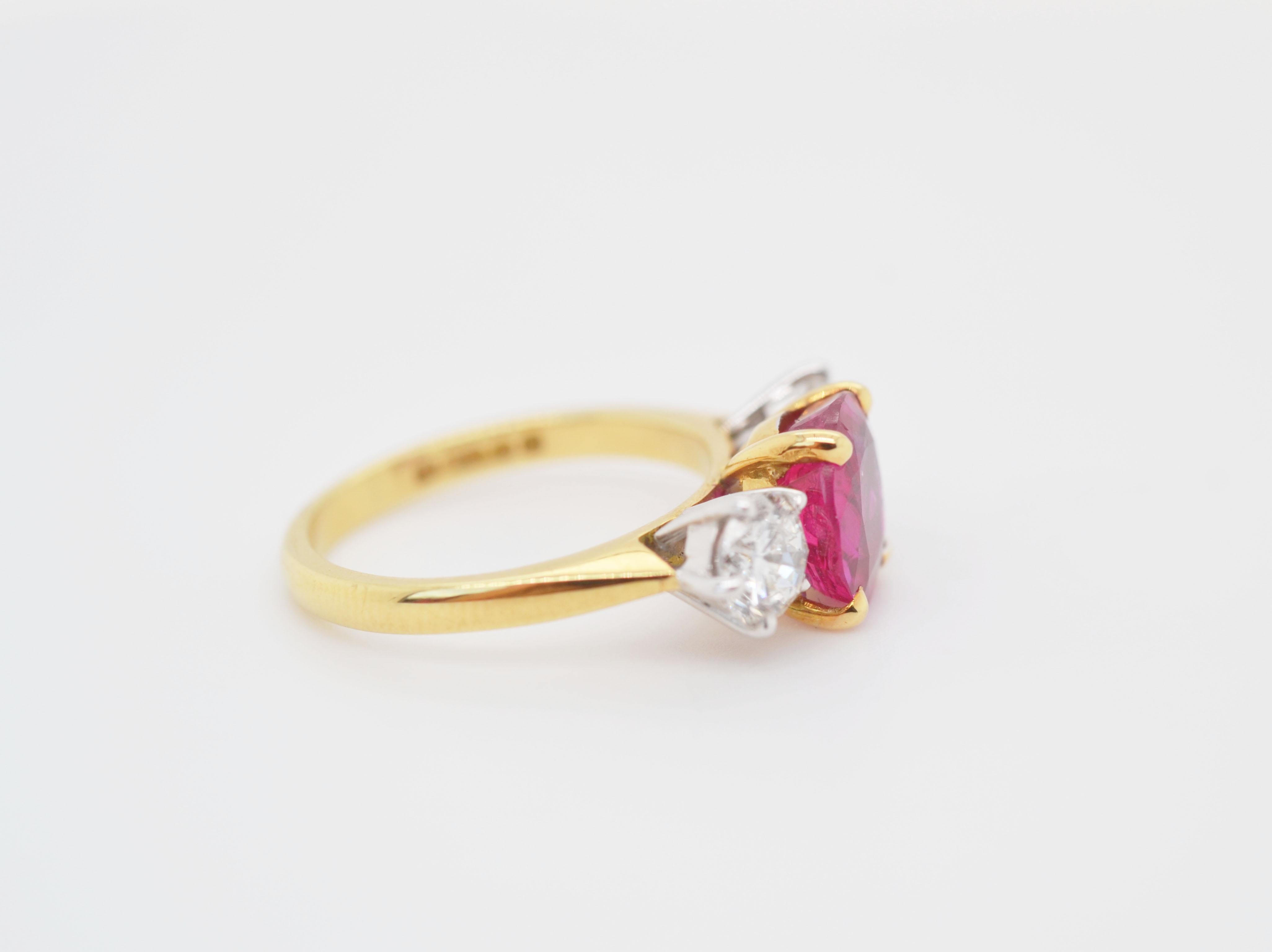 Contemporary Ruby and Diamond 3 Stone Ring in Yellow Gold For Sale