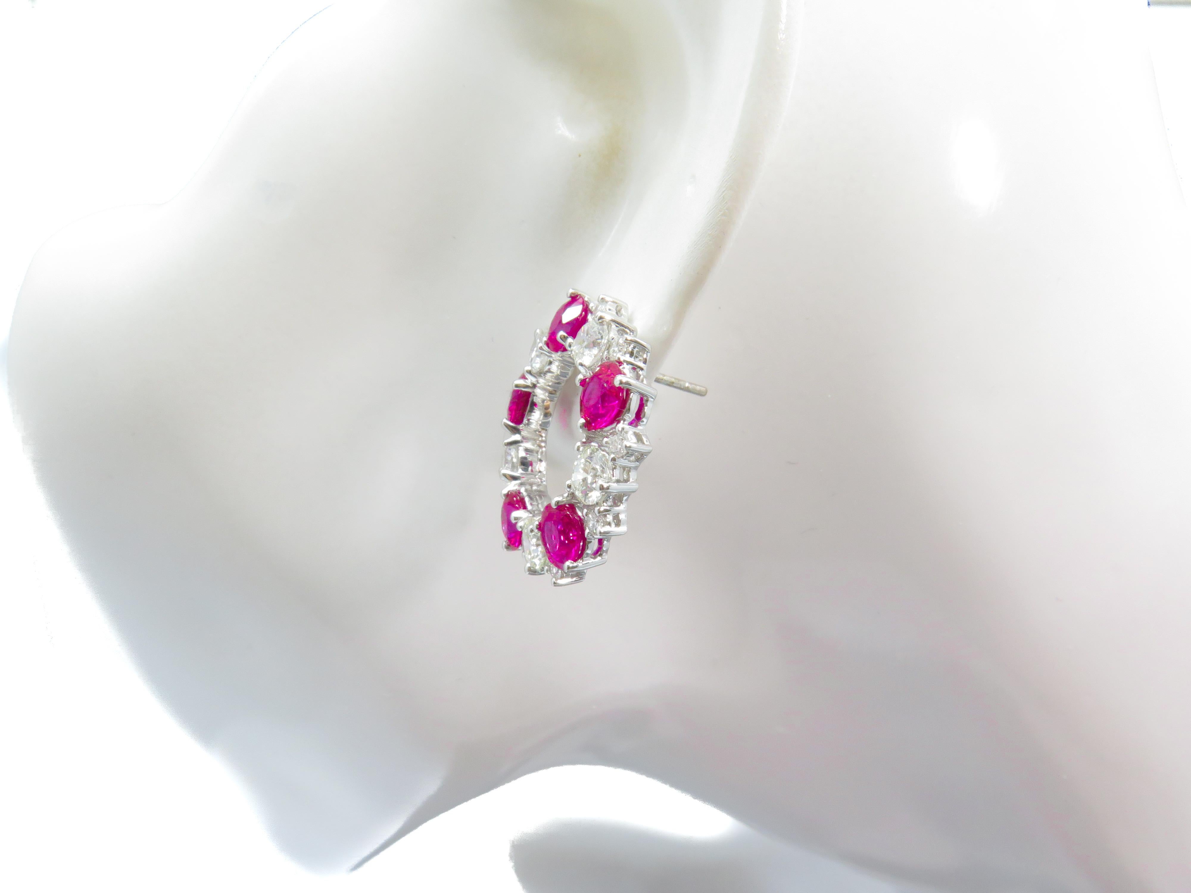 Ruby is a stone of divine creativity and symbol of good fortune, pure love, and loyalty. 

These earrings are a beautiful example of creativity. Rubies totalling an impressive 5.40cts are alternately set with round brilliant diamonds. Set in 18