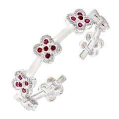 Bracelet manchette en or blanc 18 carats avec rubis, diamants et 37 grammes