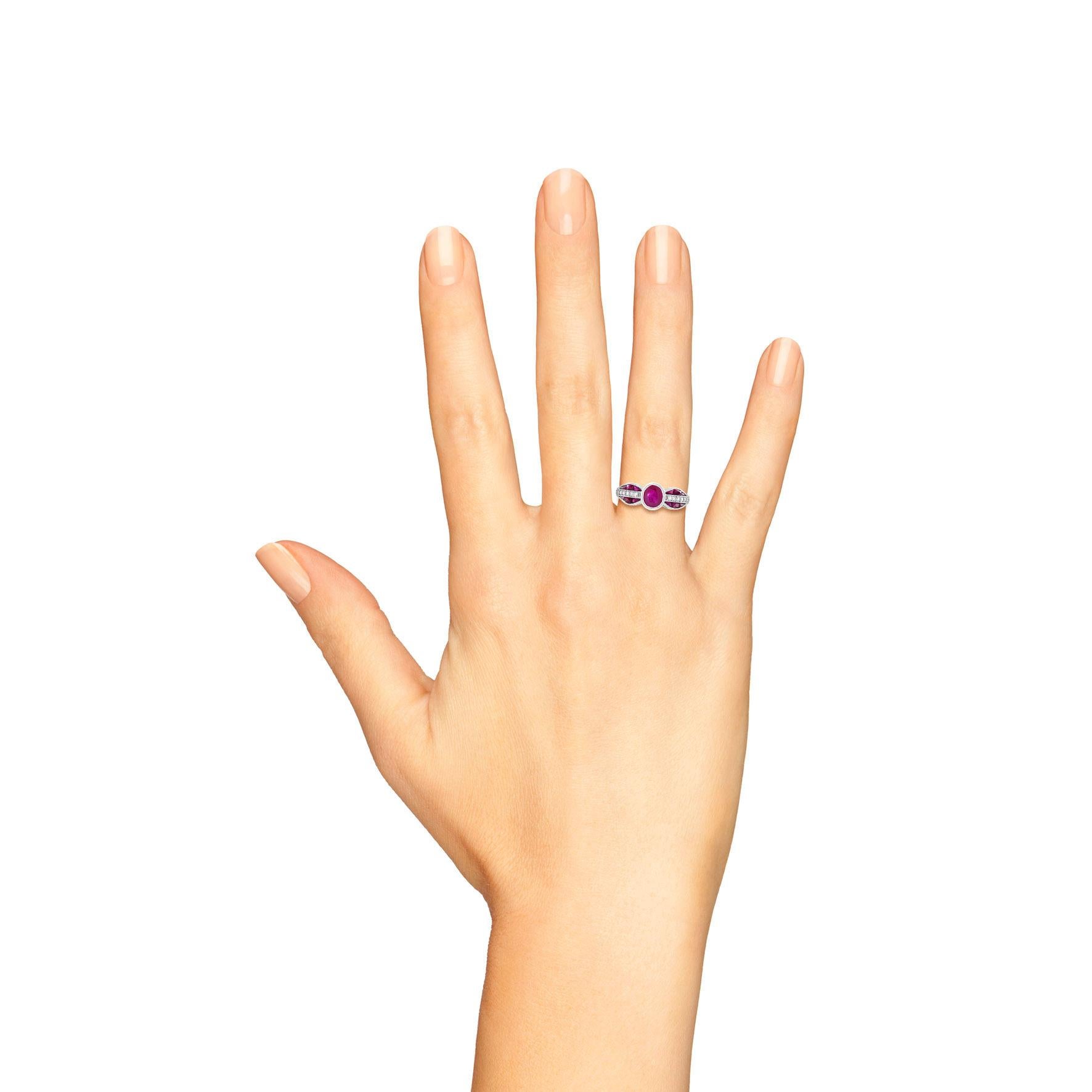 Ruby and diamond ring showcases one round cut ruby weighing approximately 0.76 carat. Interspersed with 16 round cut diamonds and displaying 12 French cut rubies accents weighing a total of 1.10 carats. This stunning ring would make the perfect