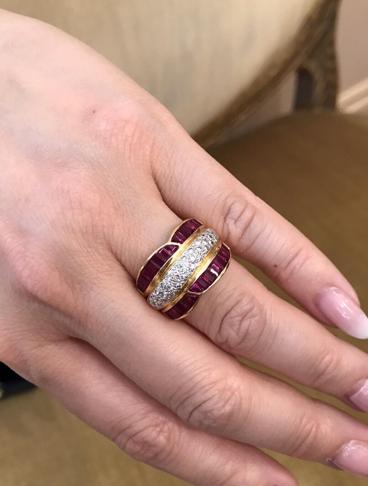 Ruby and Diamond Wide Band Ring in 18k Yellow Gold

Ruby and Diamond cocktail band features a Diamond pavè dome section center totaling 0.55 carats accented with 2 rows of Ruby Baguettes on the edges, all set in 18k Yellow Gold.

Total diamond