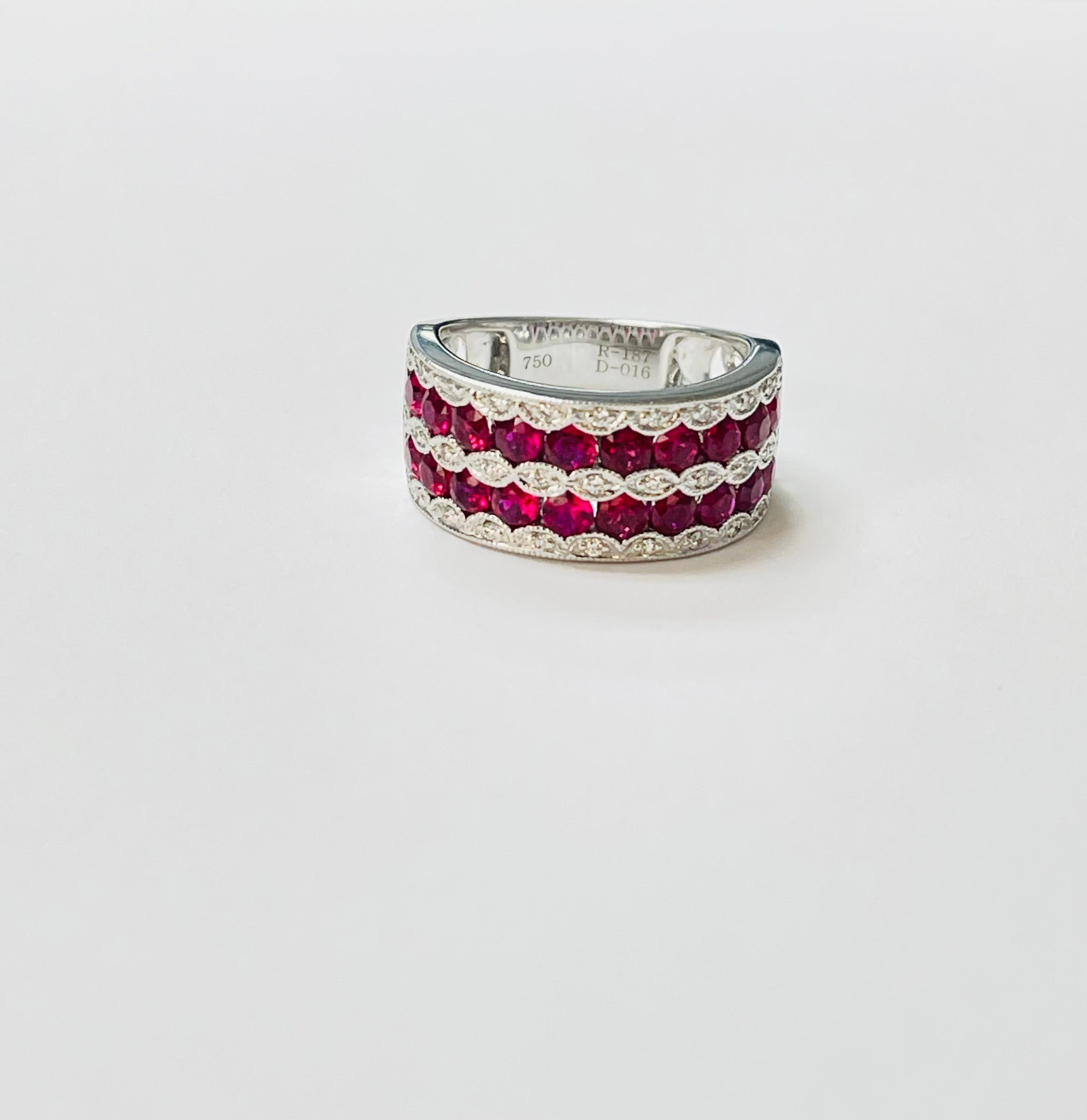 Ruby and Diamond Band Ring beautifully handcrafted in 18 Karat White Gold.

The details are as follows : 

Ruby weight: 1.87 carat 
Diamond weight : 0.16 carat 
Metal : 18 K white gold 
Ring size : 6 