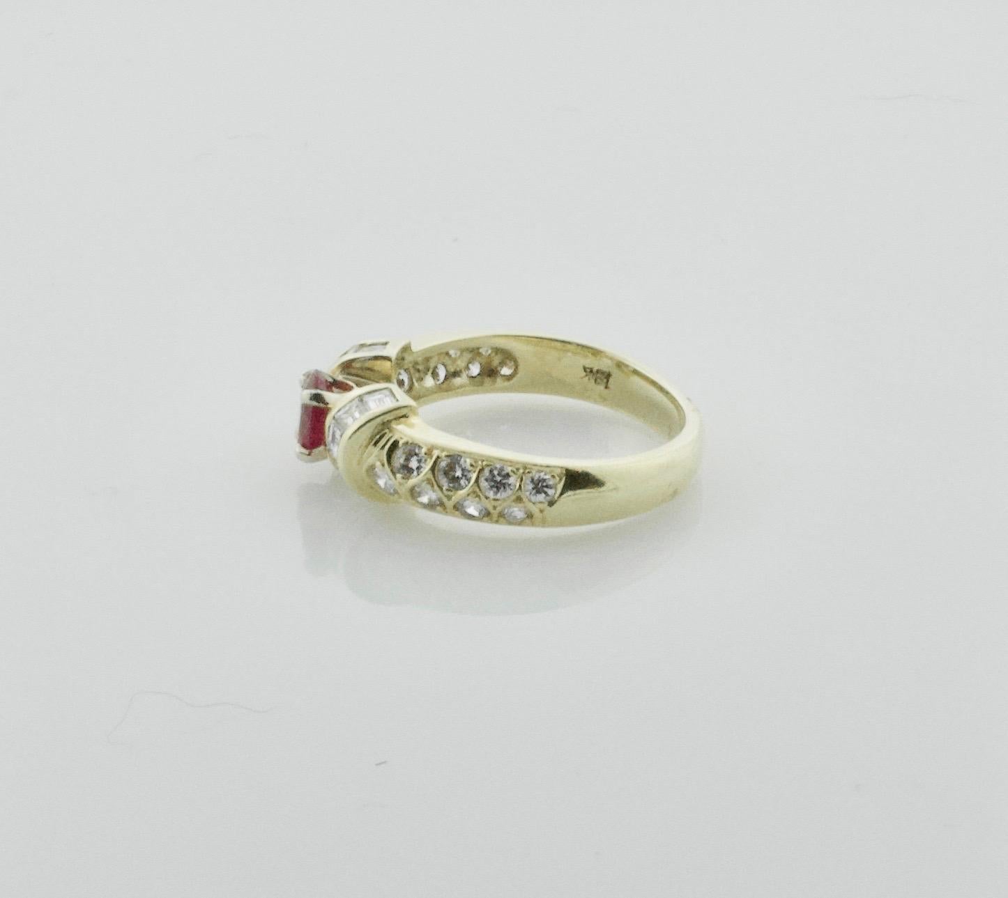 Ruby and Diamond Band Ring in 18k Yellow Gold
One Oval Ruby Weighing .50 Carats Approximately [bright with no imperfections visible to the naked eye]
Ten Round Brilliant Cut Diamonds Weighing .30 Carats Approximately [GH VVS-VS]
Sixteen Round