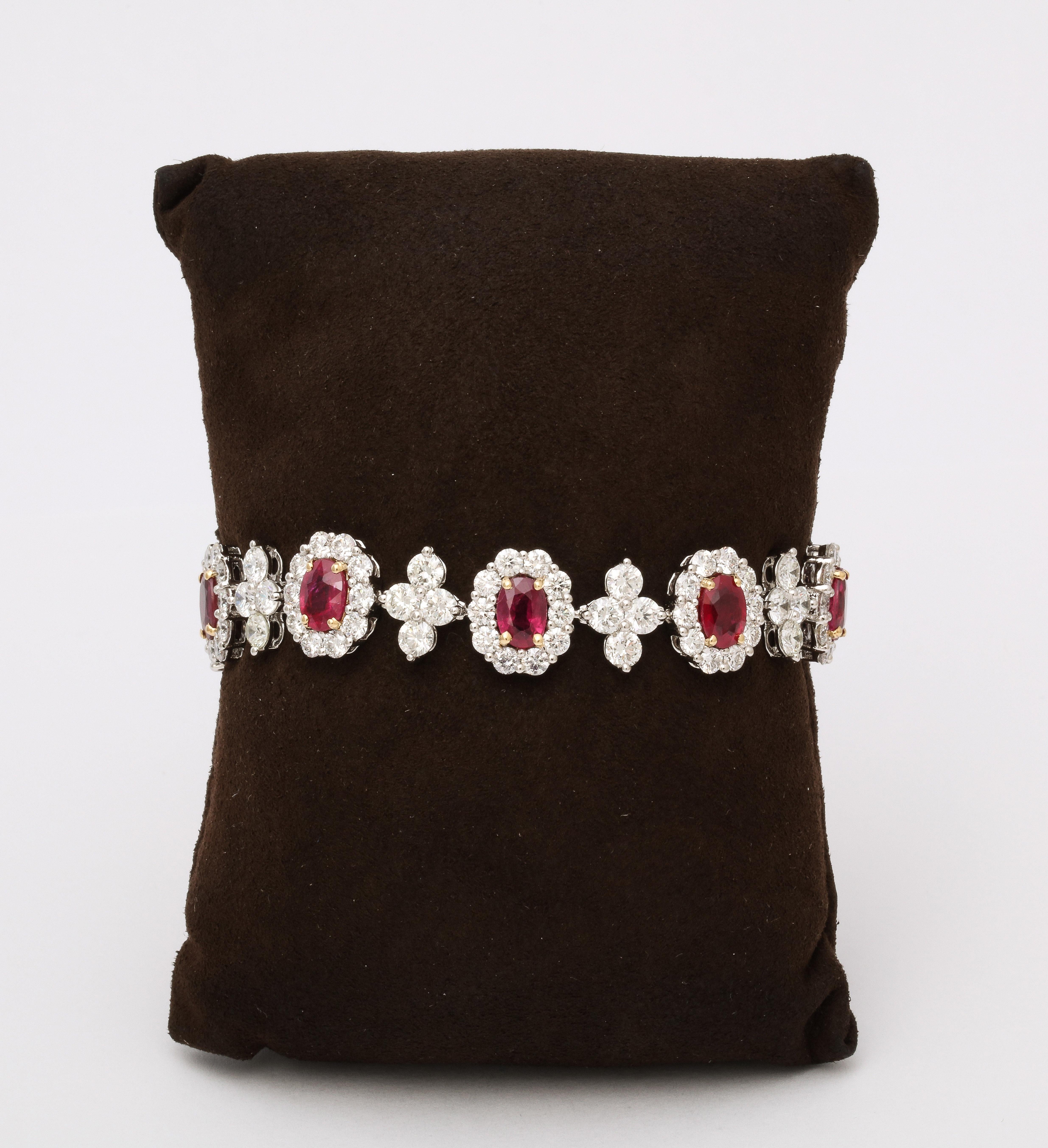 
A timeless design. 

9.20 carats of Fine Oval Ruby. 

14.56 carats of white round brilliant cut diamonds. 

Set in platinum 

7.25 inch length. 

A beautiful bracelet set with vibrant and bright Ruby. 