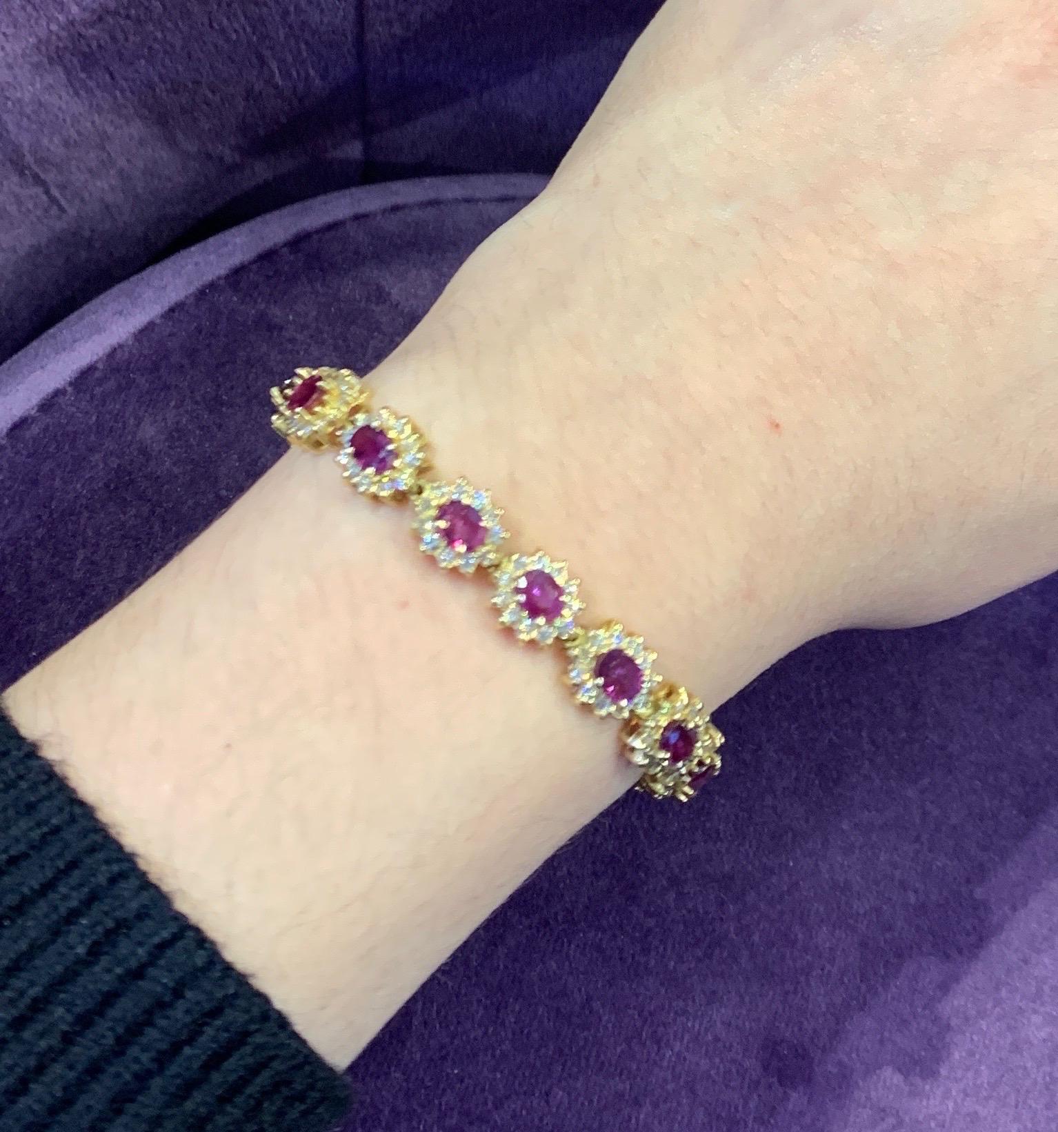Ruby and Diamond Bracelet 

Yellow gold bracelet set with 18 oval rubies and 198 round diamonds. 

Metal Type: 14-karat gold

Approx. ruby weight: 6.12 carats
Approx. combined diamond weights: 3.96 carat
Approximate Length: 7.5